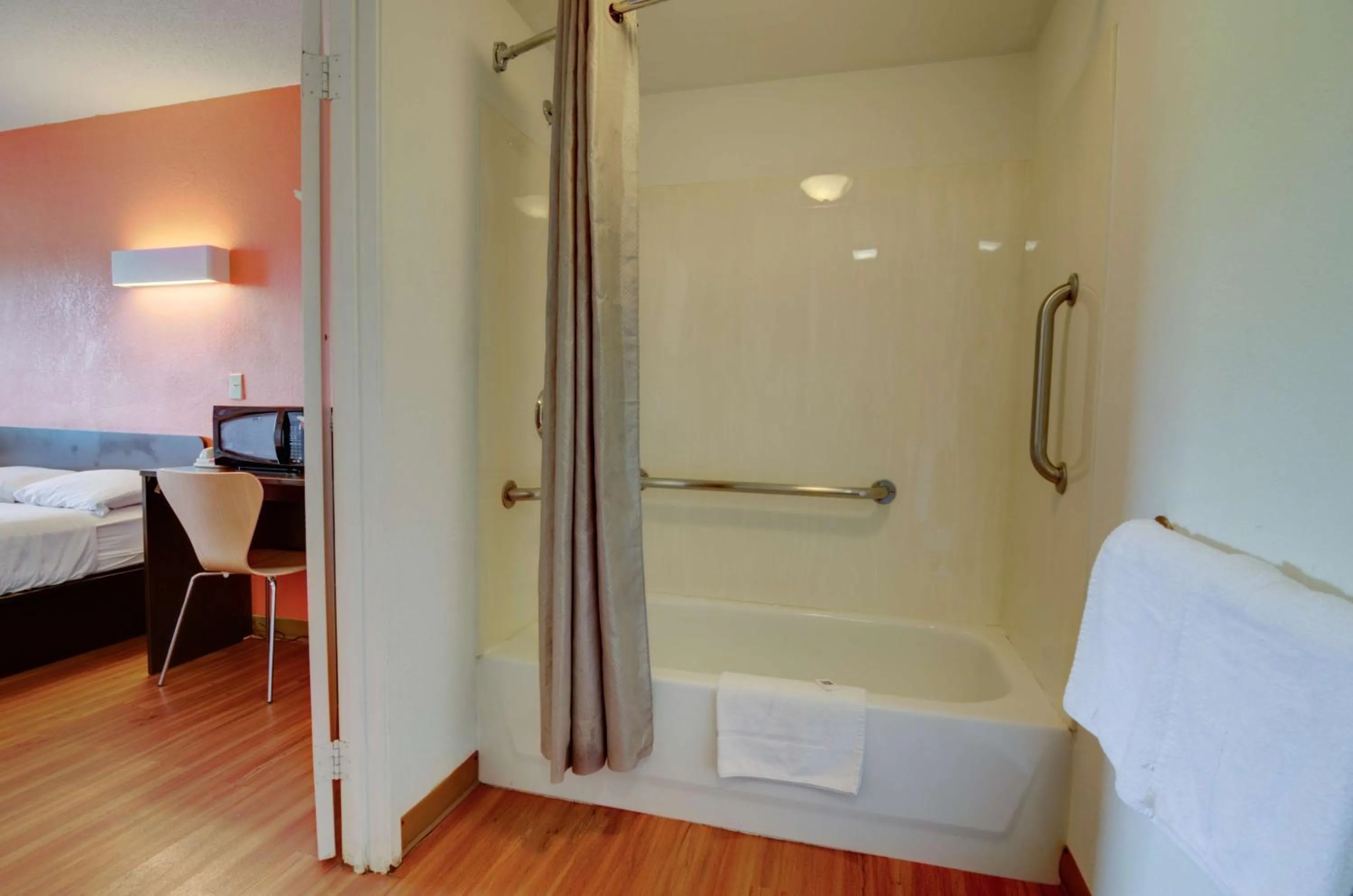 Bathroom, Bed in Motel 6-Kansas City, MO