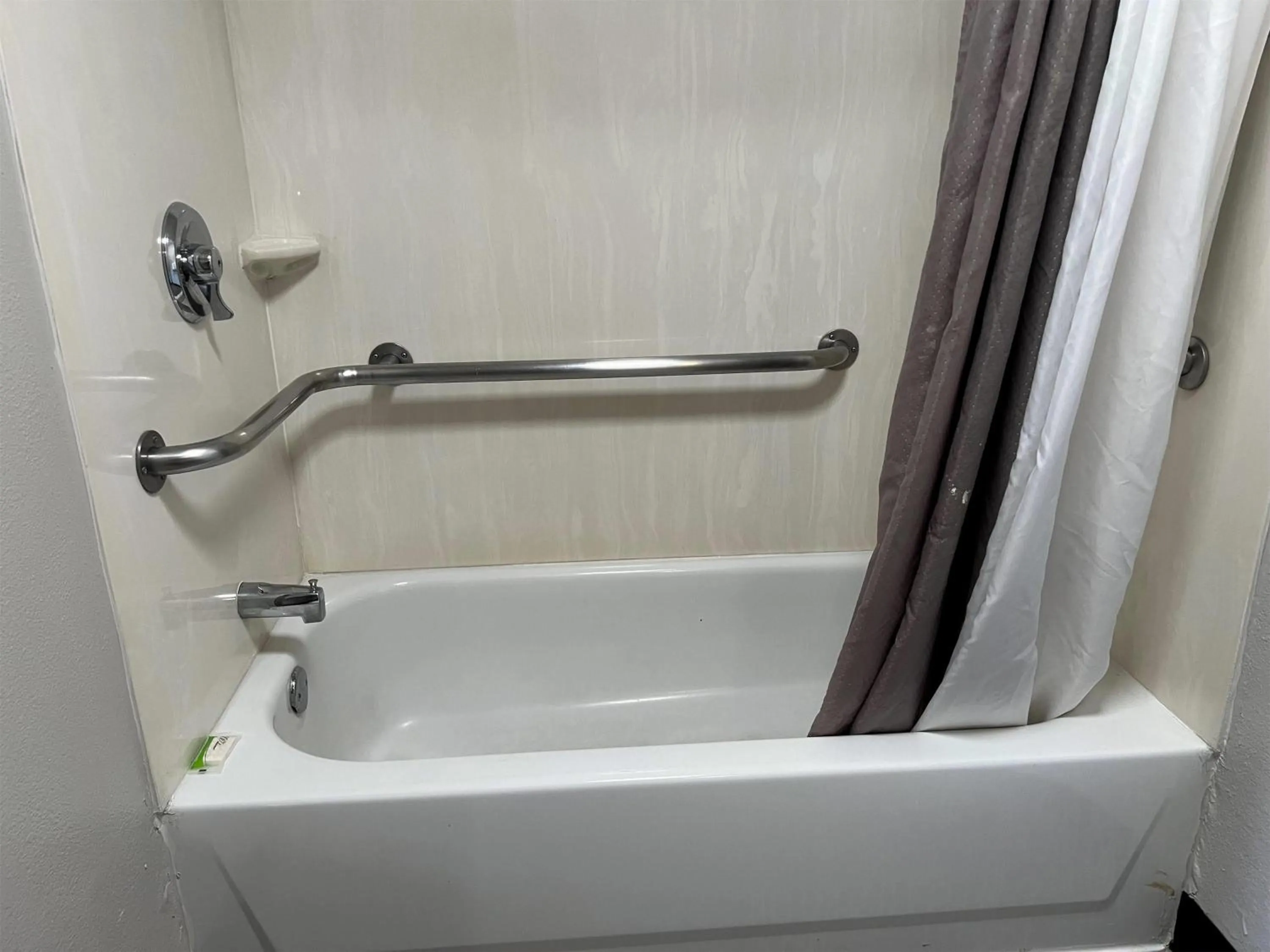 Bathroom in Days Inn by Wyndham Kansas City Northeast