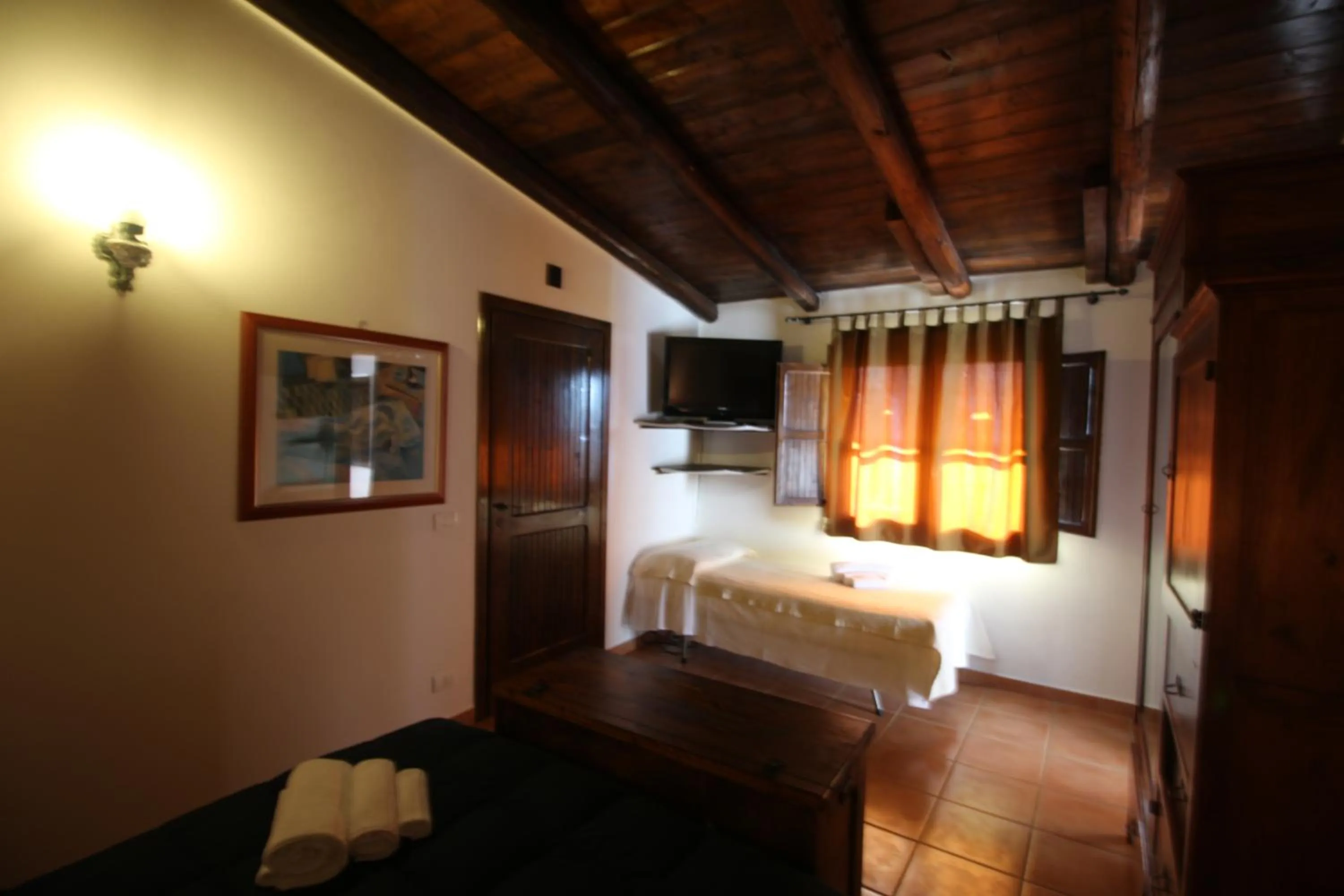 Bedroom in Aranceto Hotel