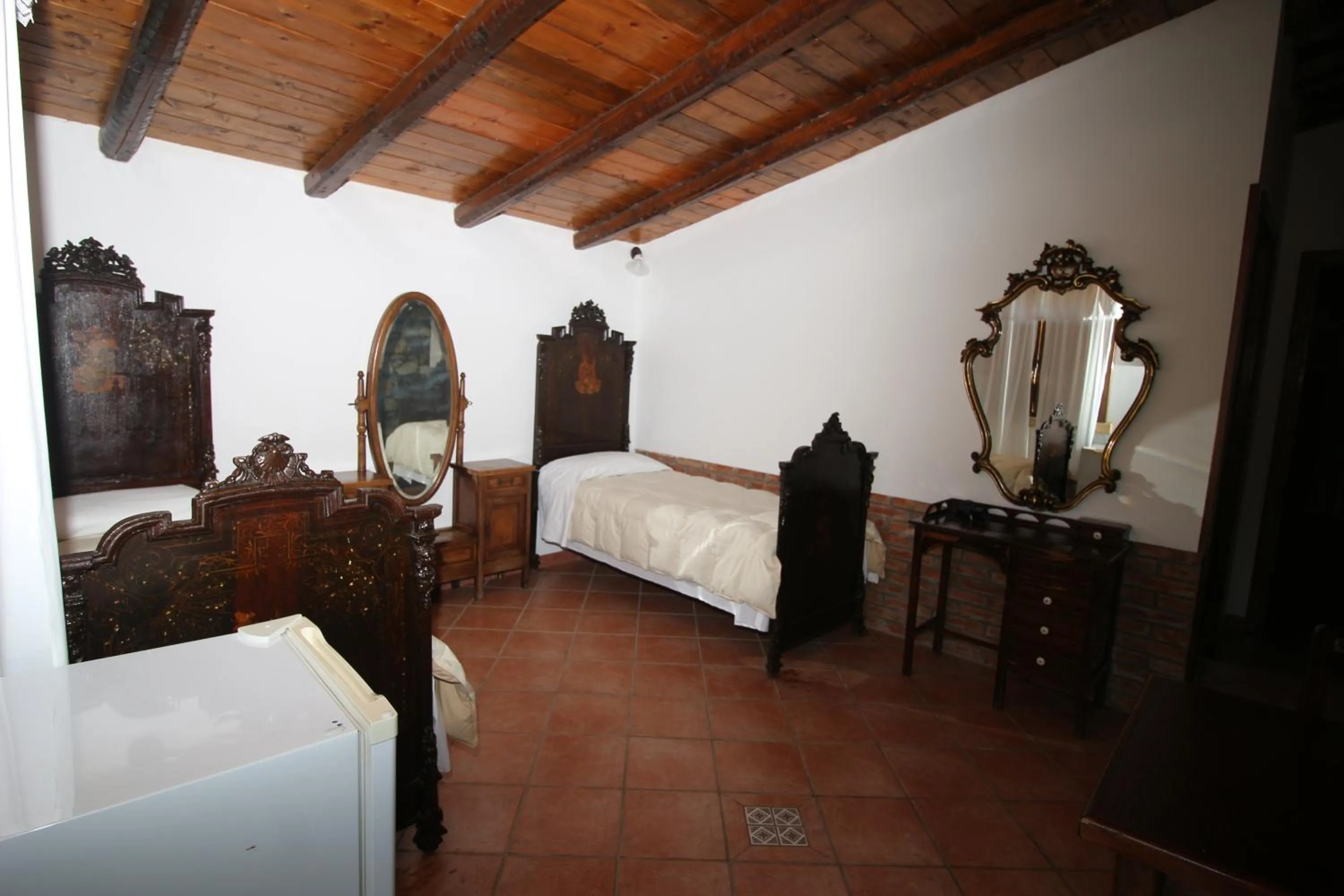 Bed in Aranceto Hotel