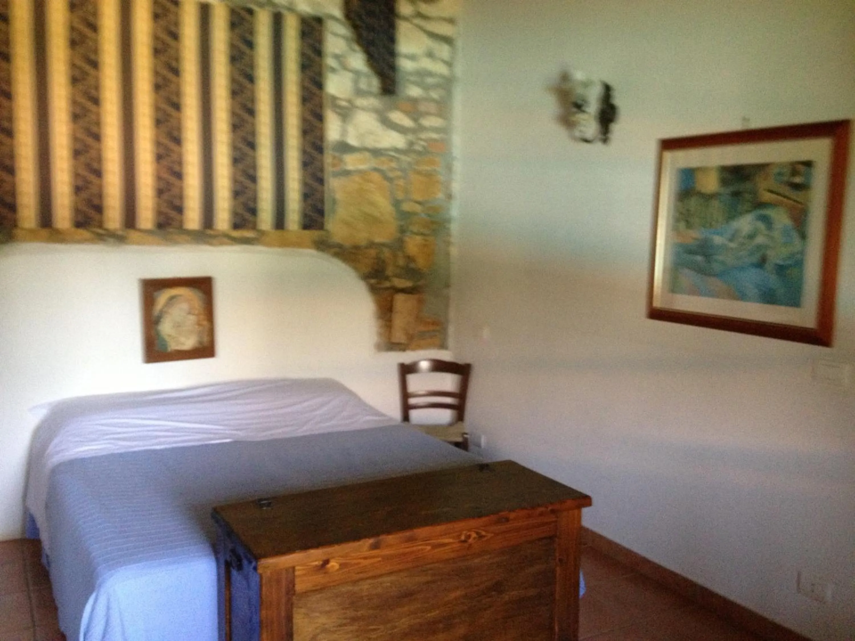 Bedroom in Aranceto Hotel