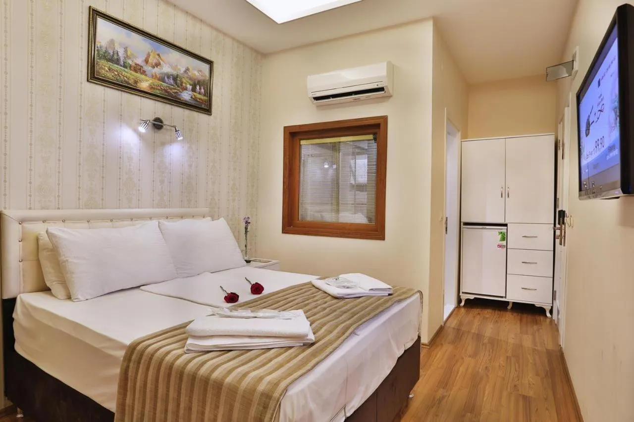 Bed in Gh Suites Taxim Hotel