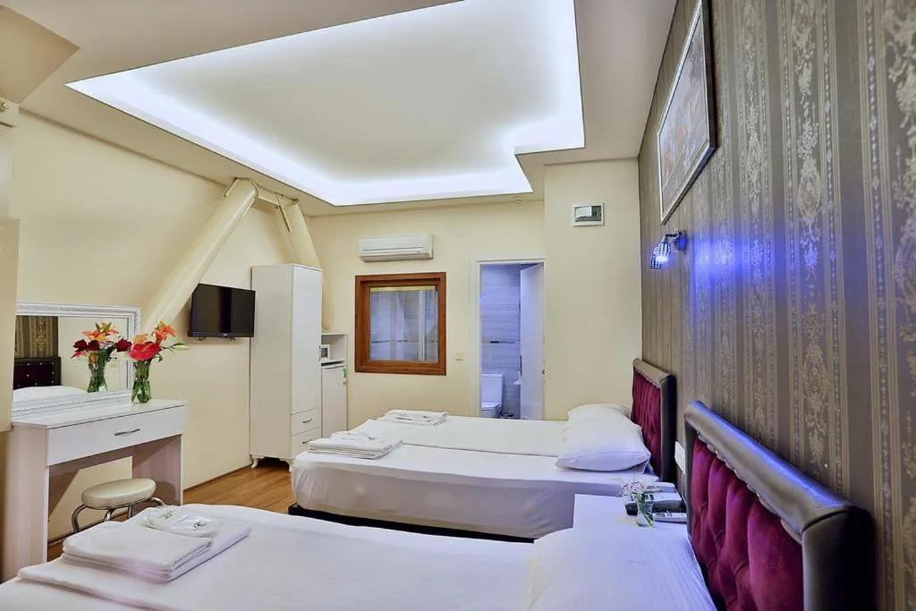 Bed in Gh Suites Taxim Hotel