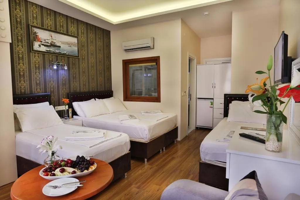 Bed in Gh Suites Taxim Hotel