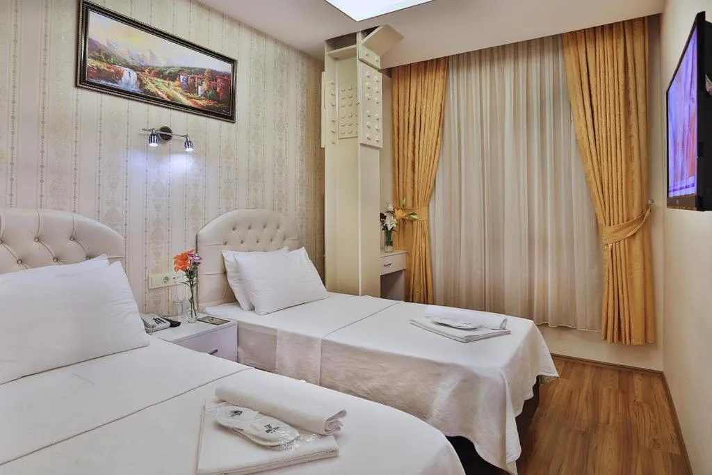 Bed in Gh Suites Taxim Hotel