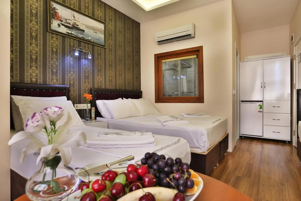 Bed in Gh Suites Taxim Hotel