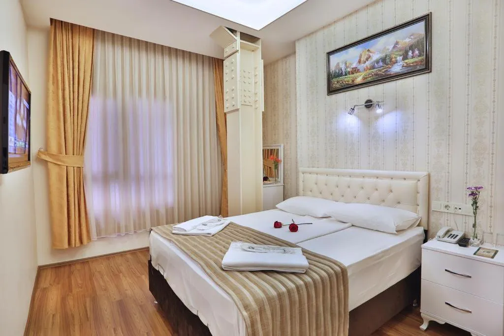 Bed in Gh Suites Taxim Hotel