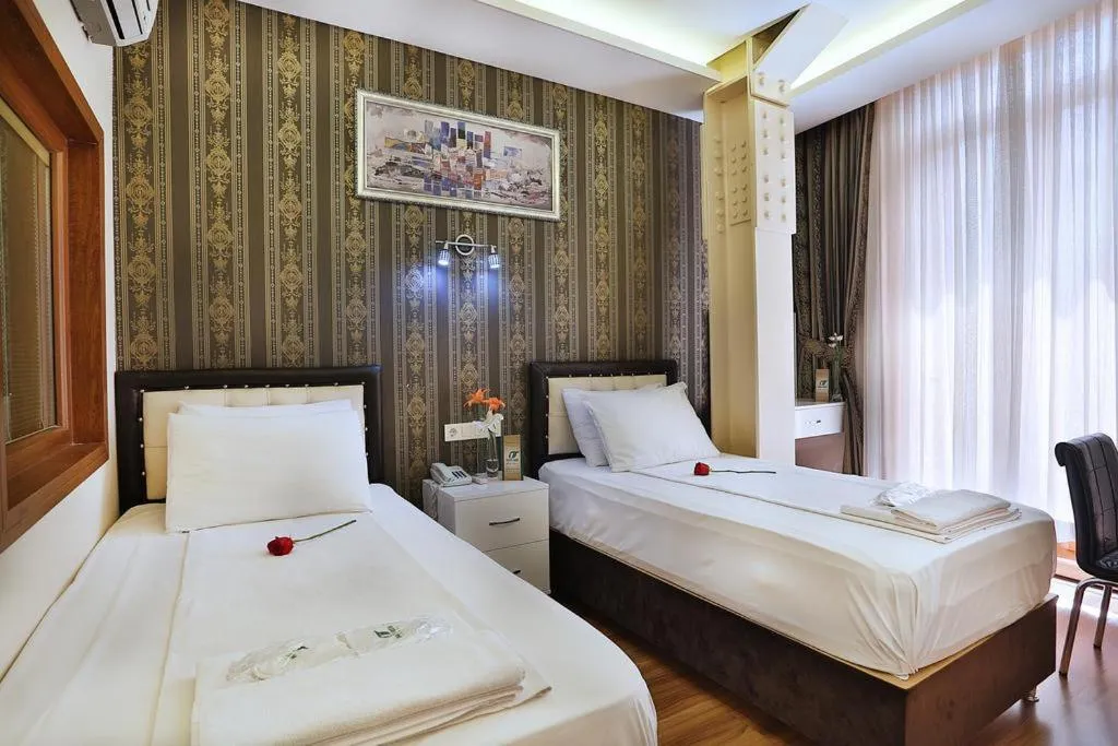 Bed in Gh Suites Taxim Hotel