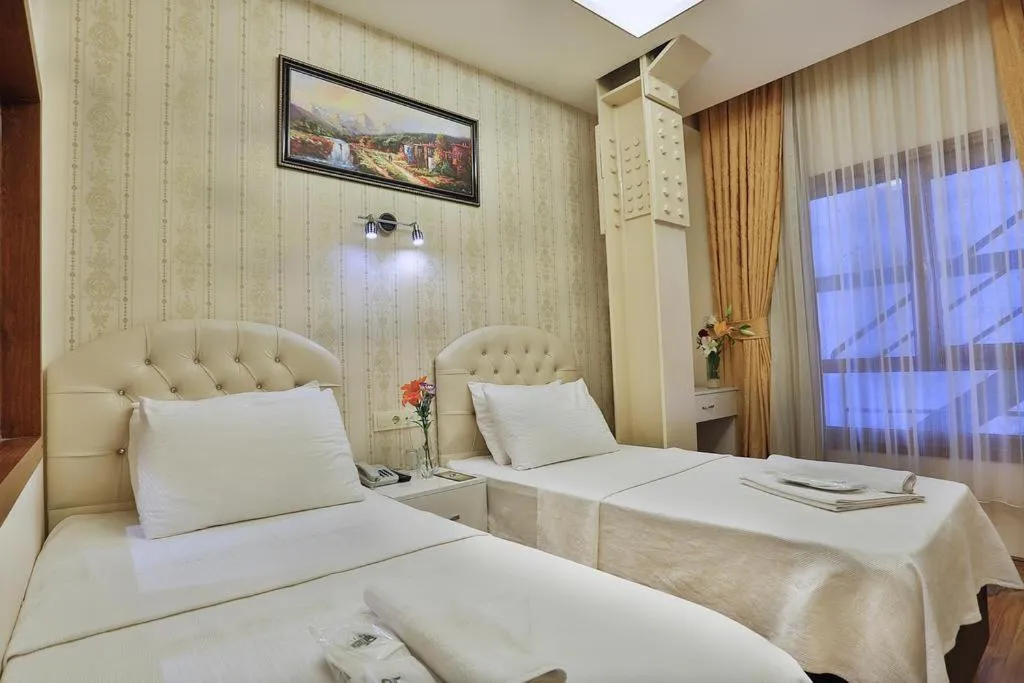 Bed in Gh Suites Taxim Hotel