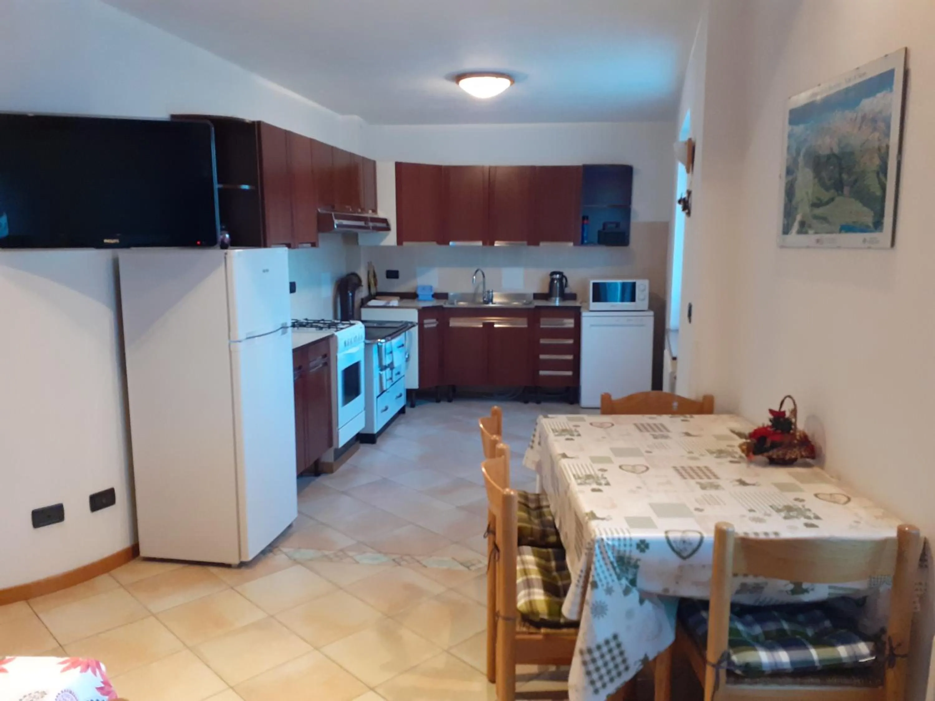 Kitchen or kitchenette in Appartamenti Rumo