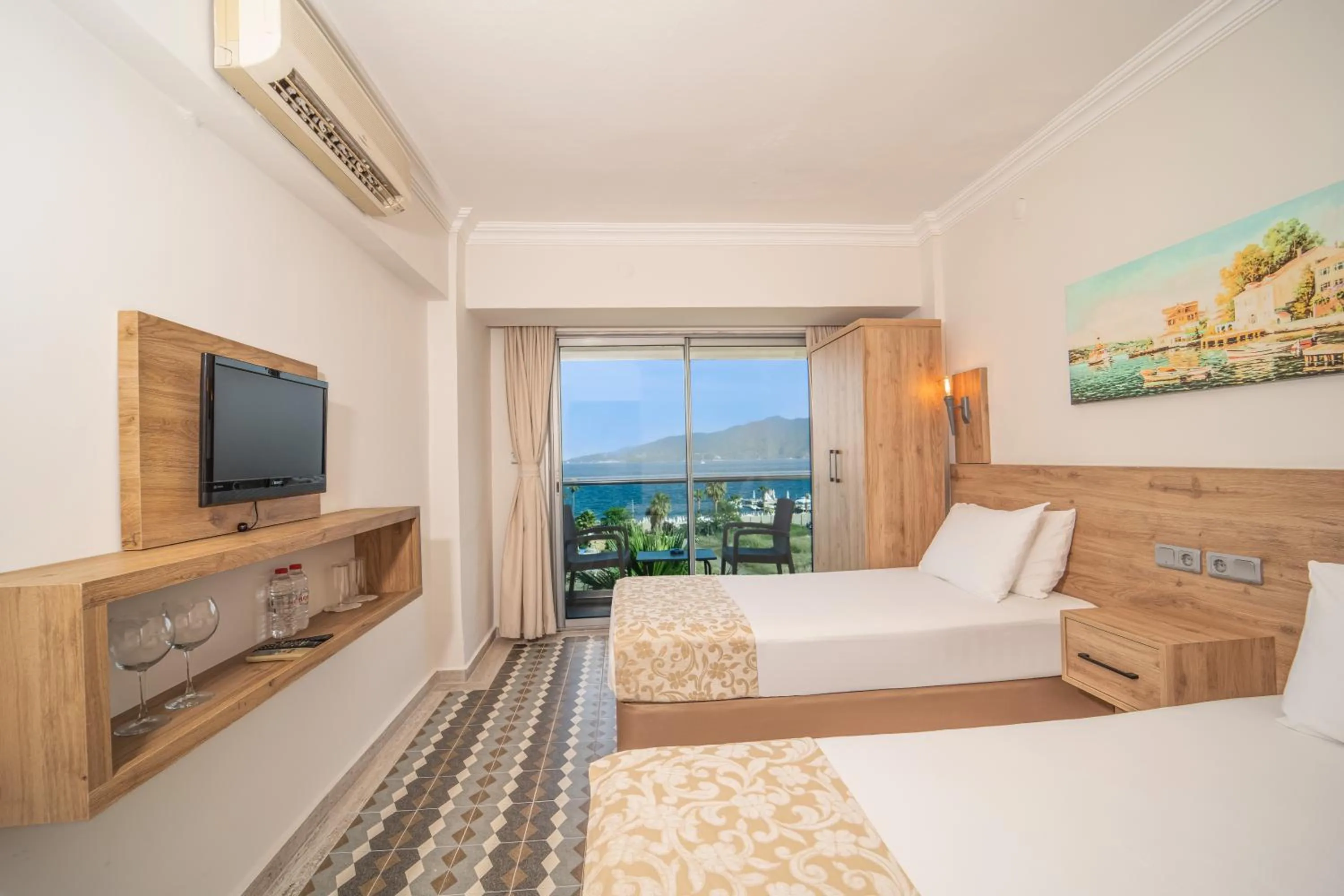 Bed in Moda Beach Hotel