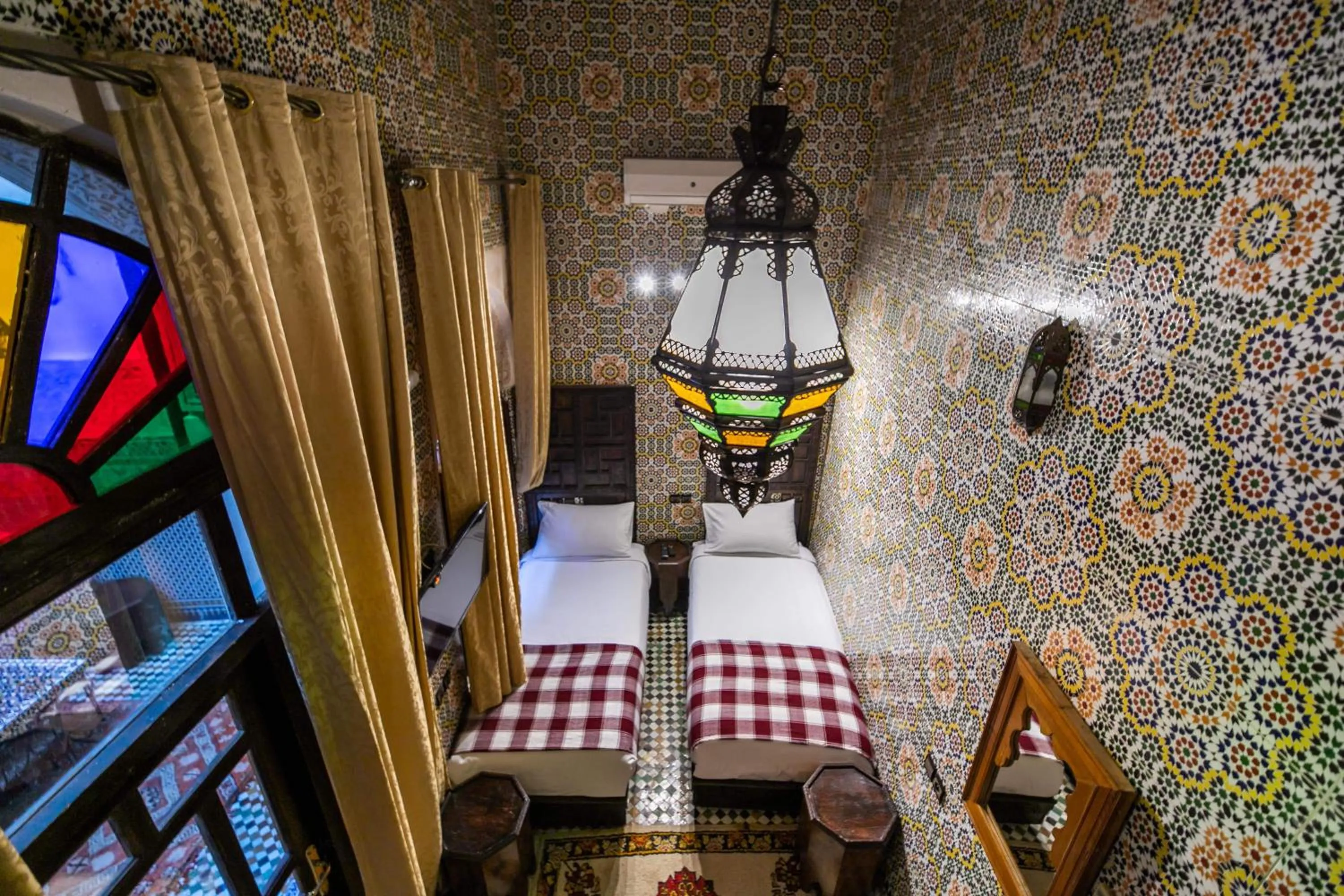 Living room, Bed in Riad Fes Aicha & SPA