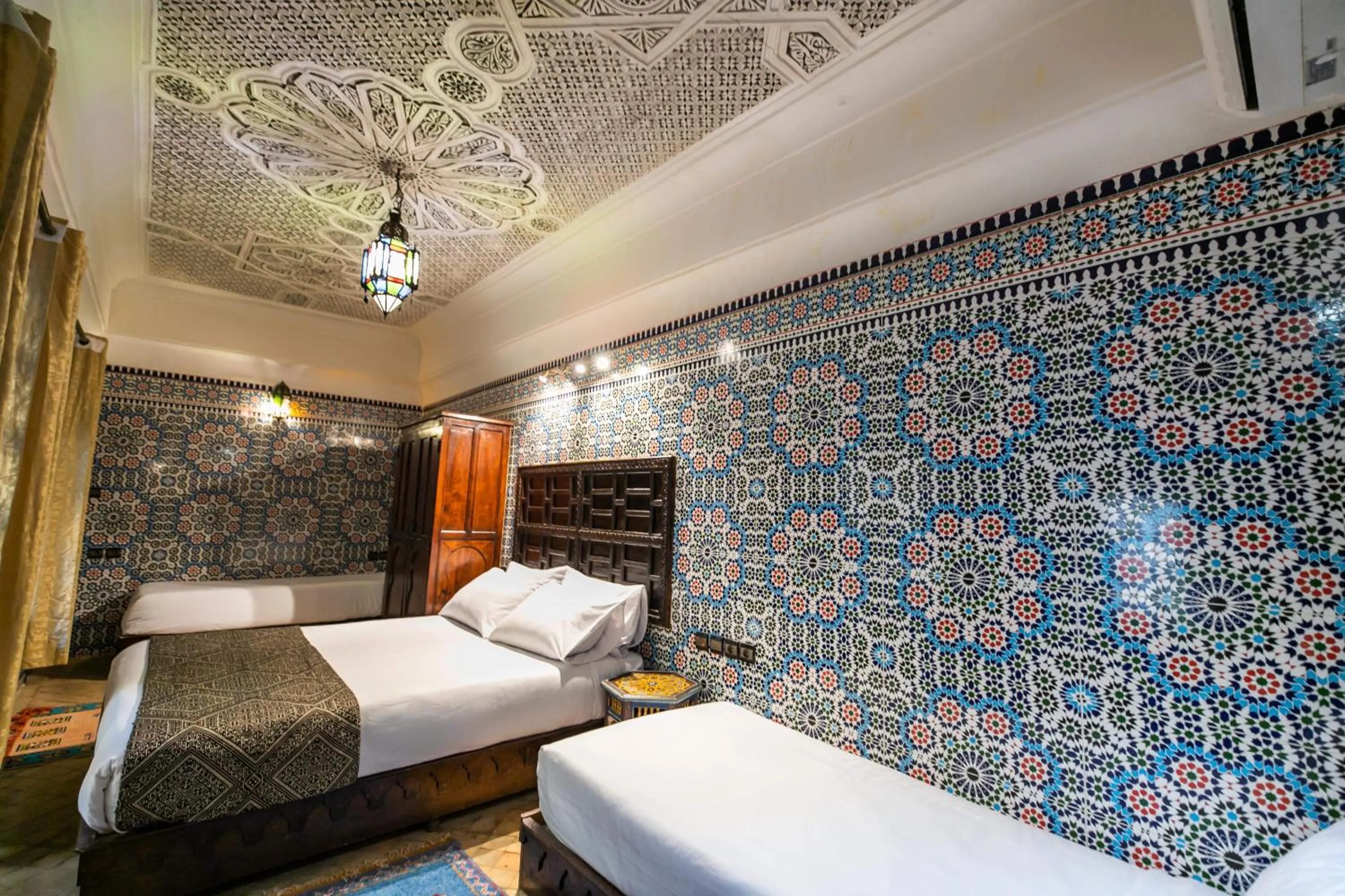 Bed in Riad Fes Aicha & SPA