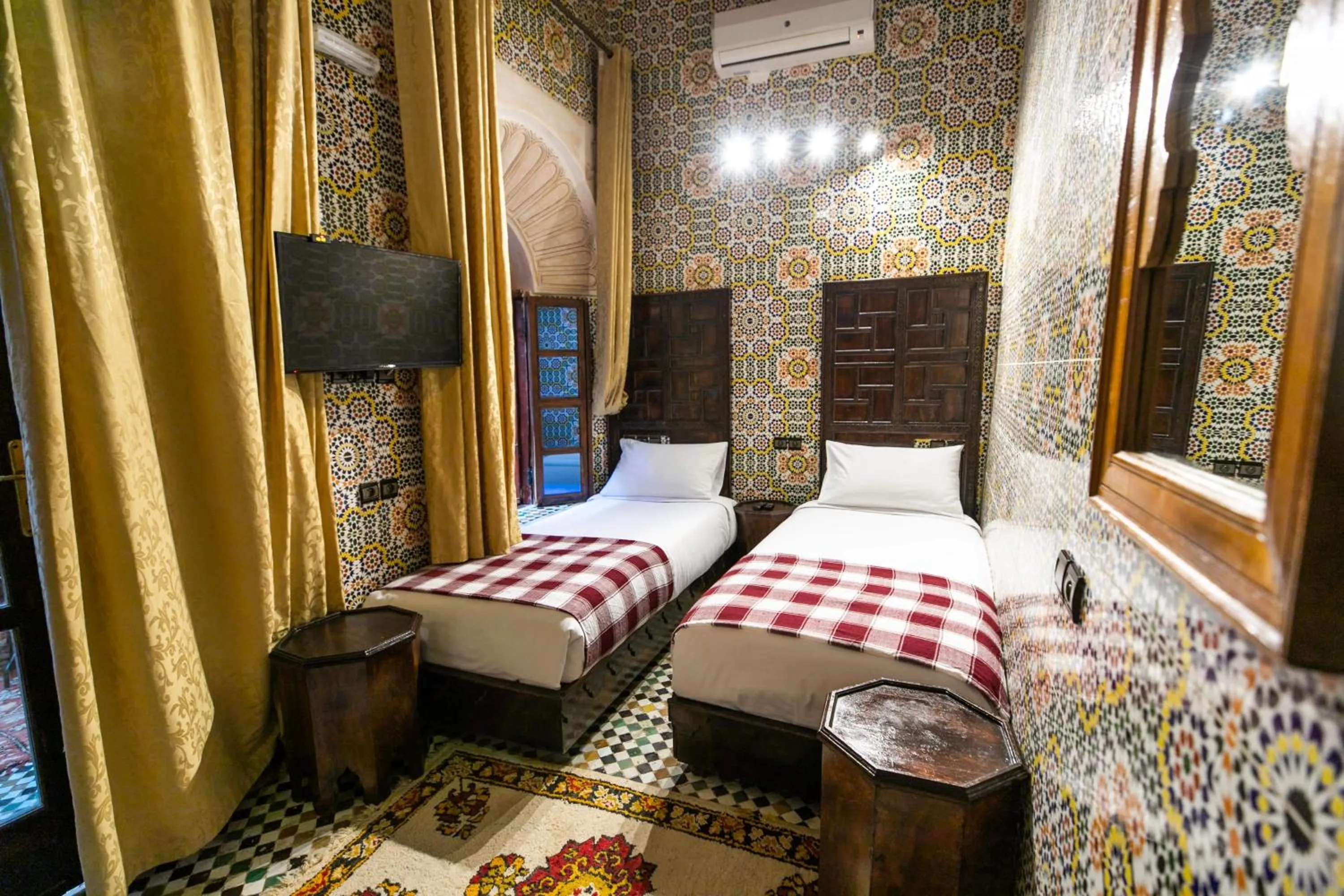 Bed in Riad Fes Aicha & SPA