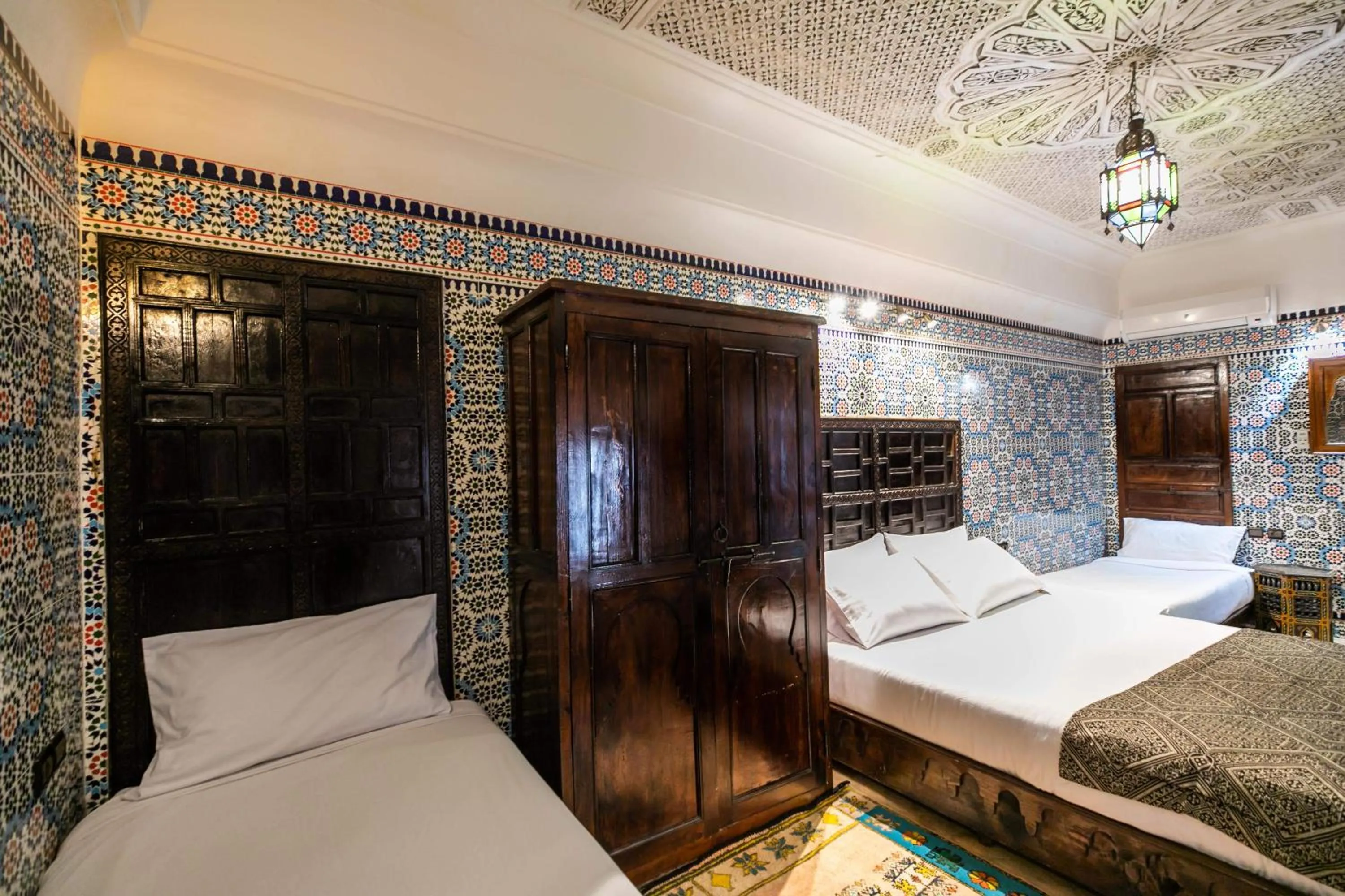 Bed in Riad Fes Aicha & SPA