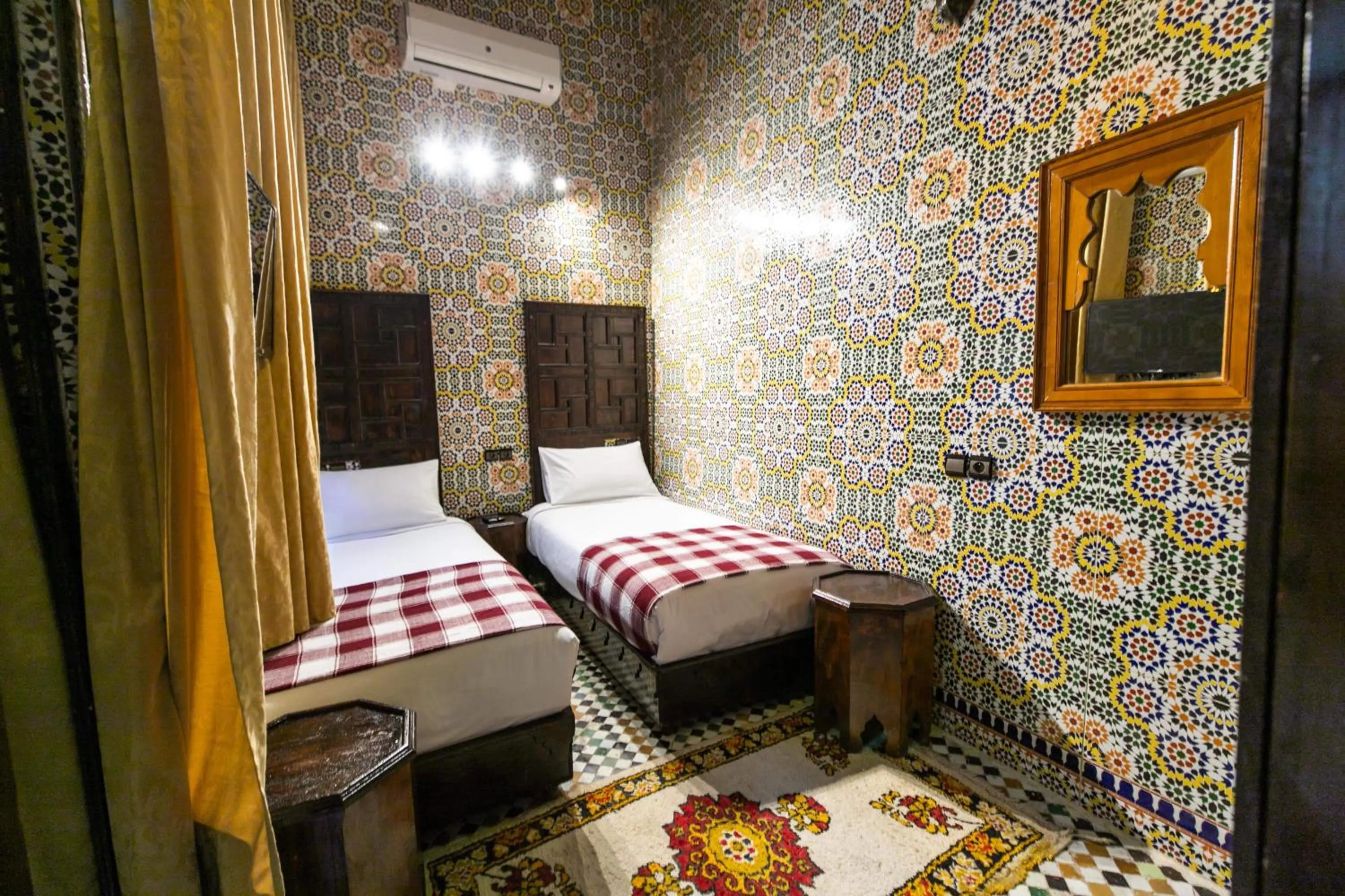 Bed in Riad Fes Aicha & SPA