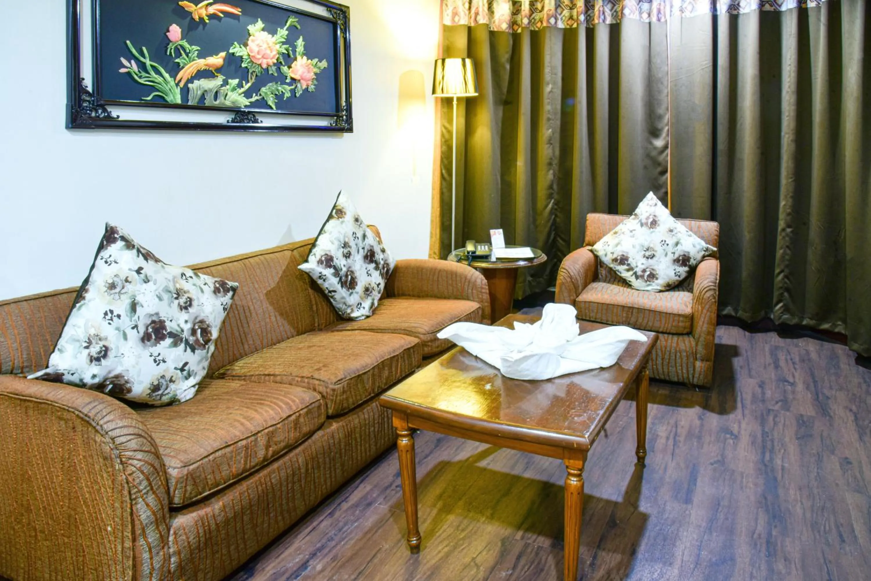Living room in Quality Inn Residency