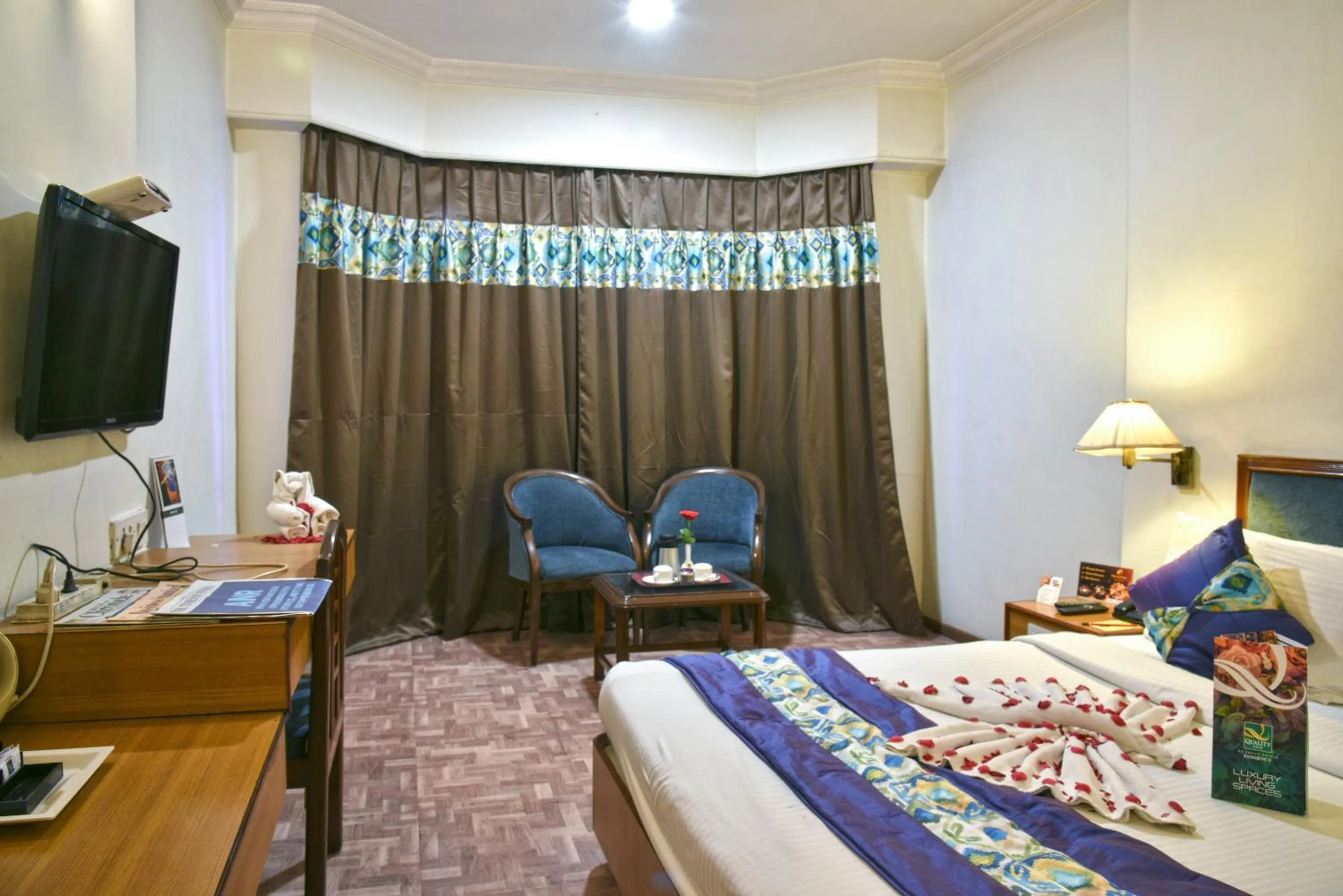 Photo of the whole room in Quality Inn Residency