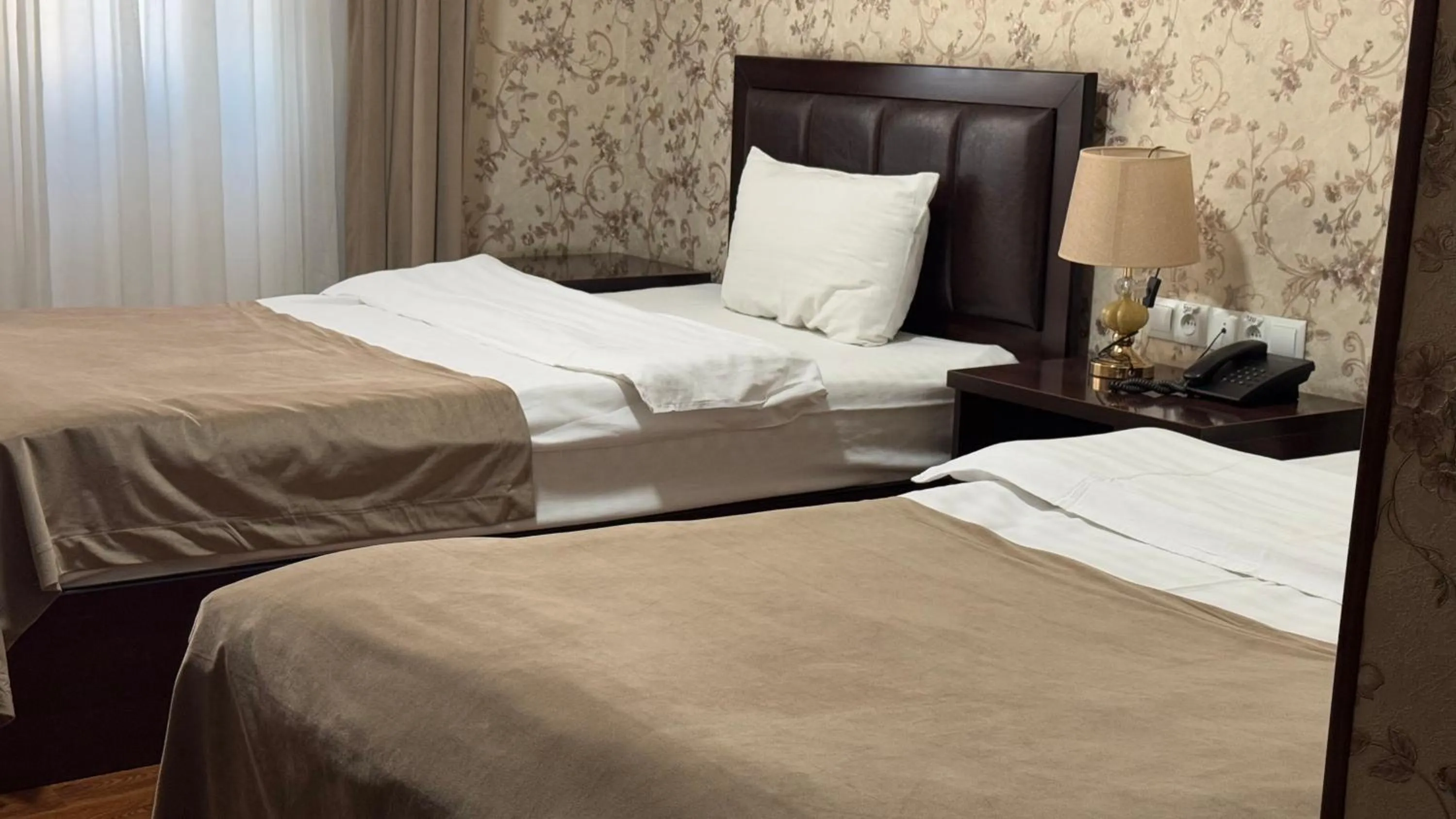 Bed in GRAND HOTEL SOGDIANA