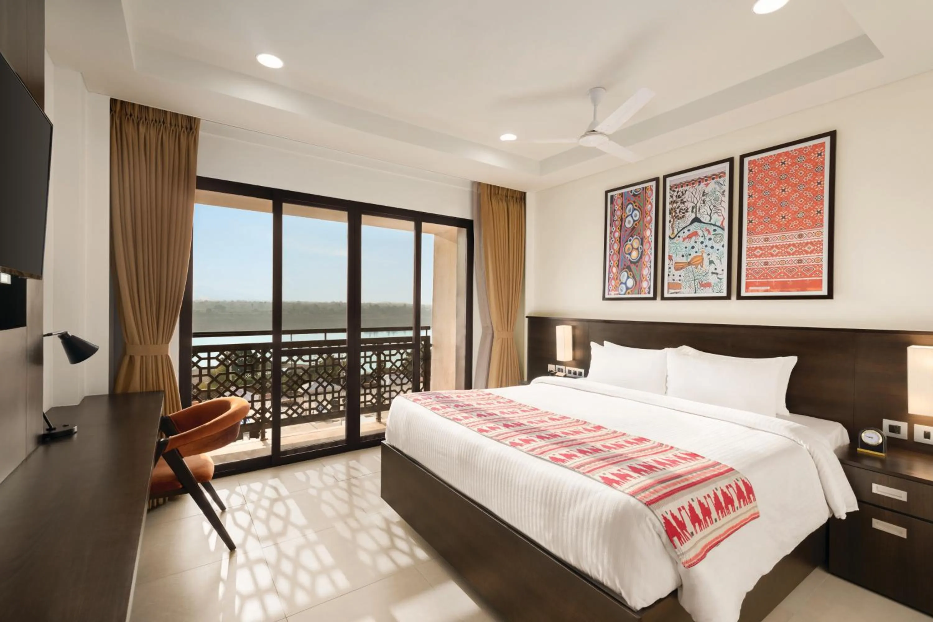 Photo of the whole room, Bed in Ramada Encore by Wyndham Statue of Unity