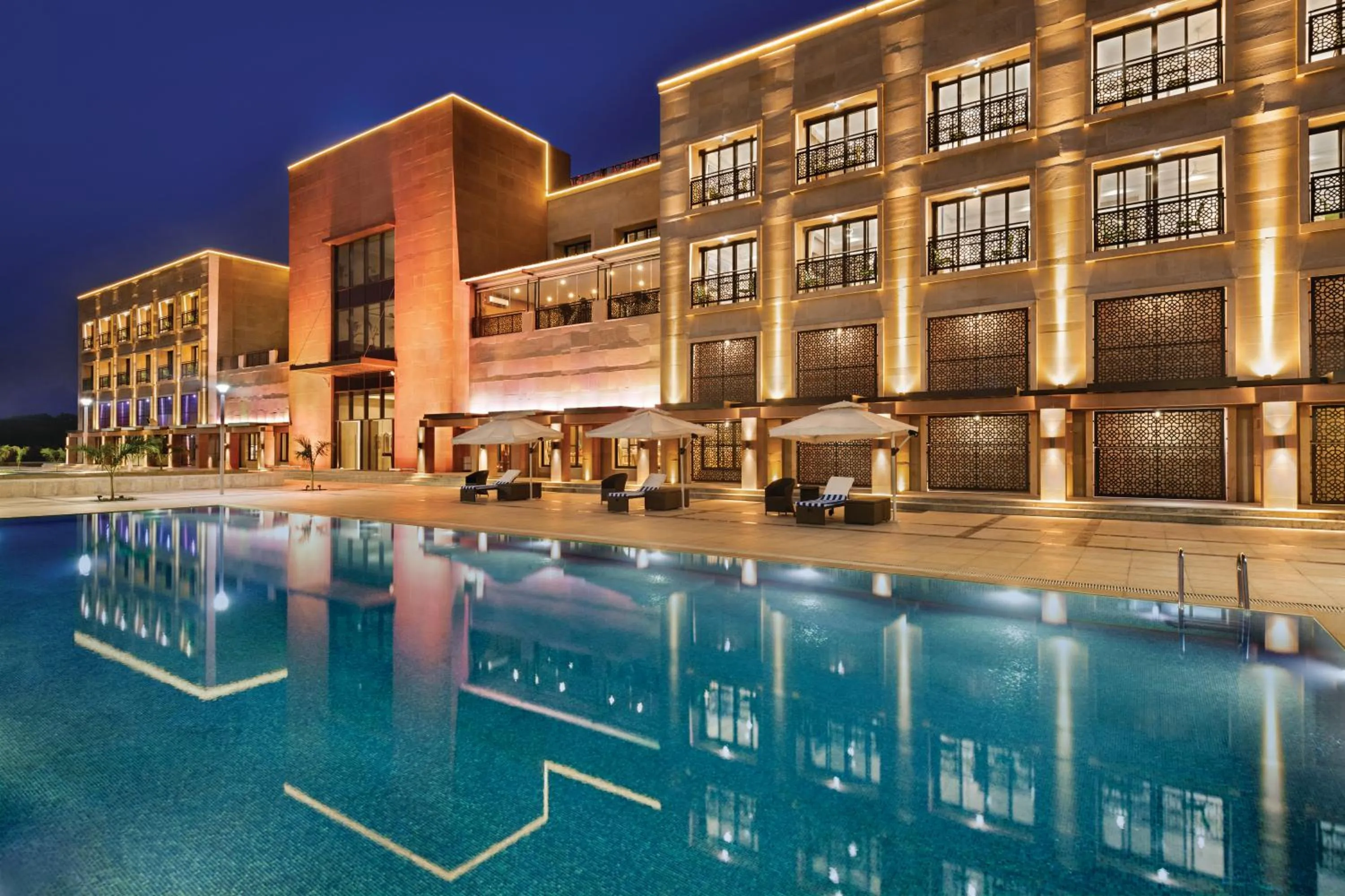 Swimming pool in Ramada Encore by Wyndham Statue of Unity