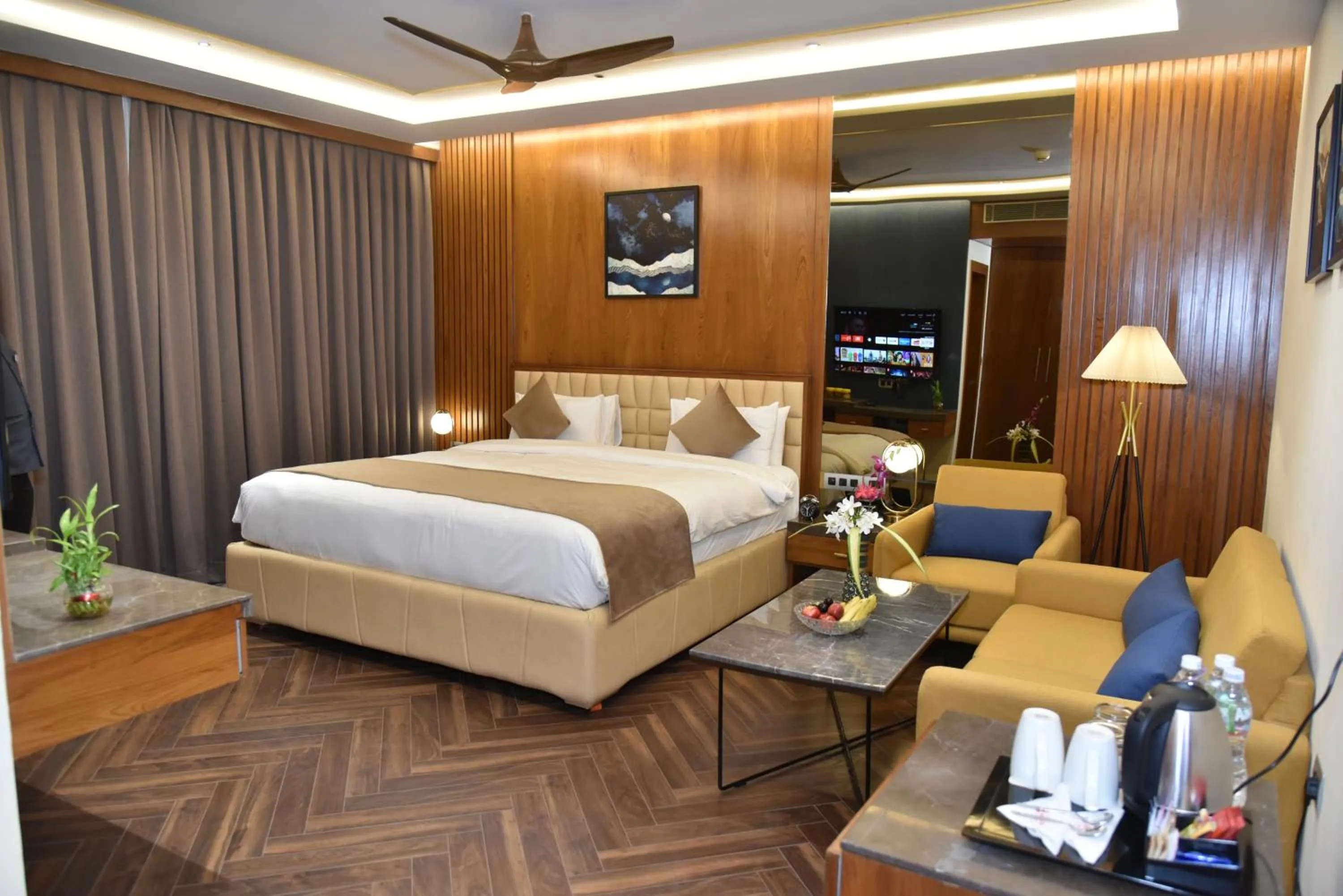 Bed in Ramada Encore by Wyndham Statue of Unity