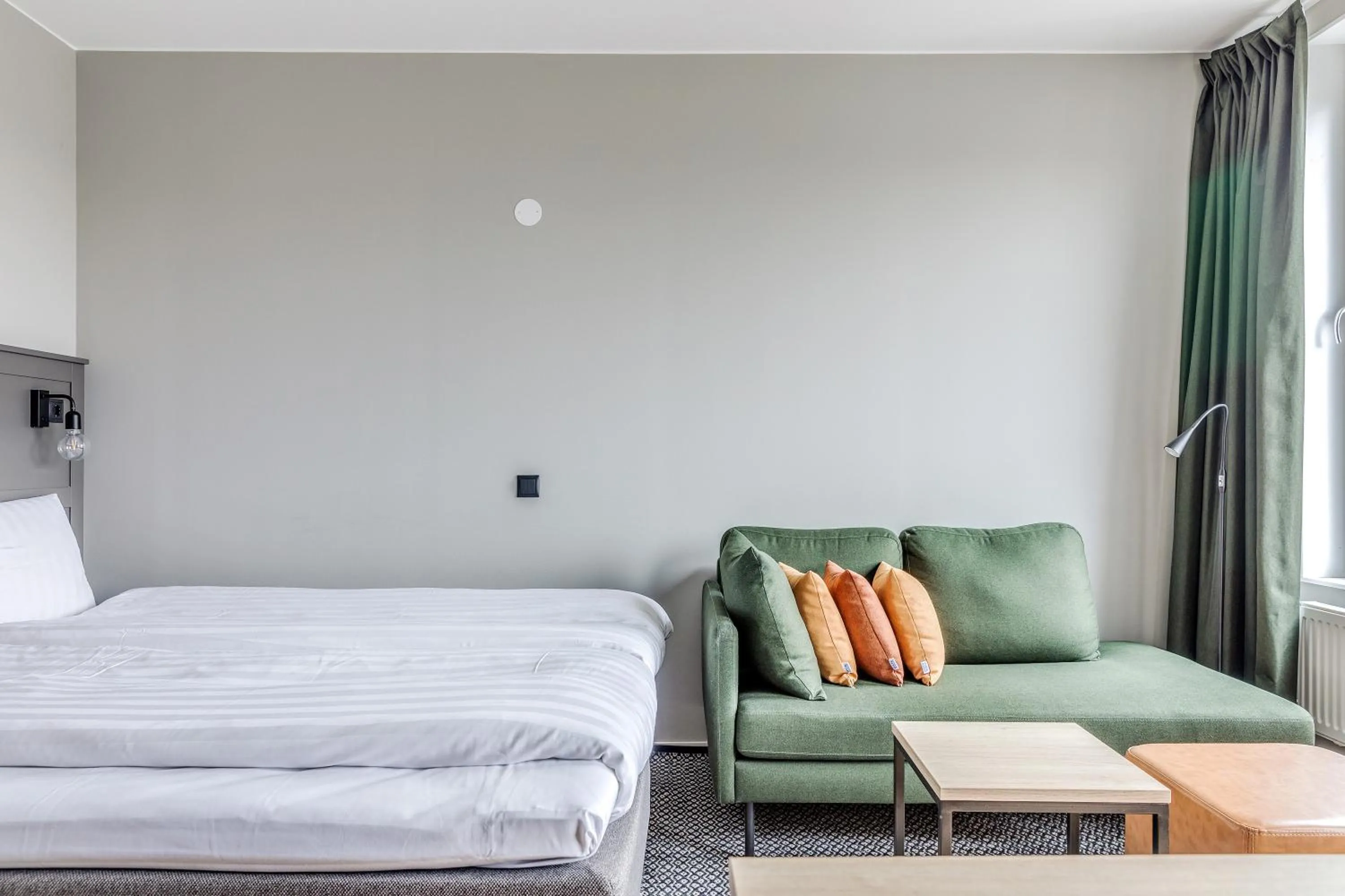 Seating area, Bed in Part-Time Home Täby