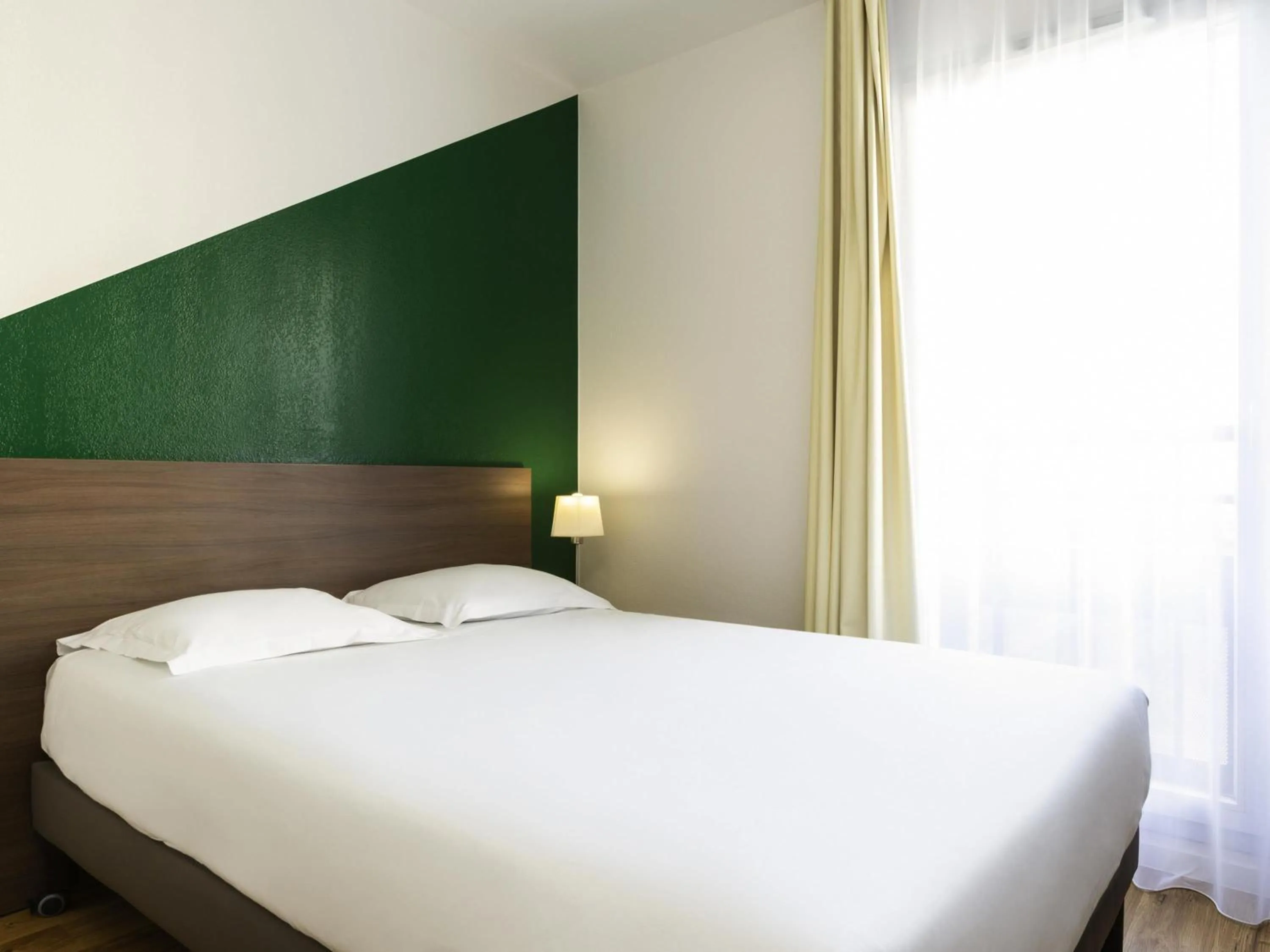 Bedroom, Bed in Aparthotel Adagio Access Carrières Sous Poissy