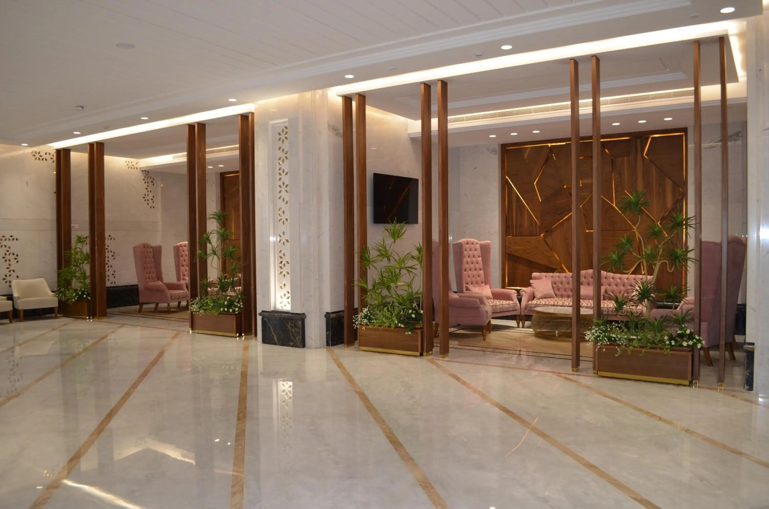 Lobby or reception in Midan Hotel & Suites Al Aziziya