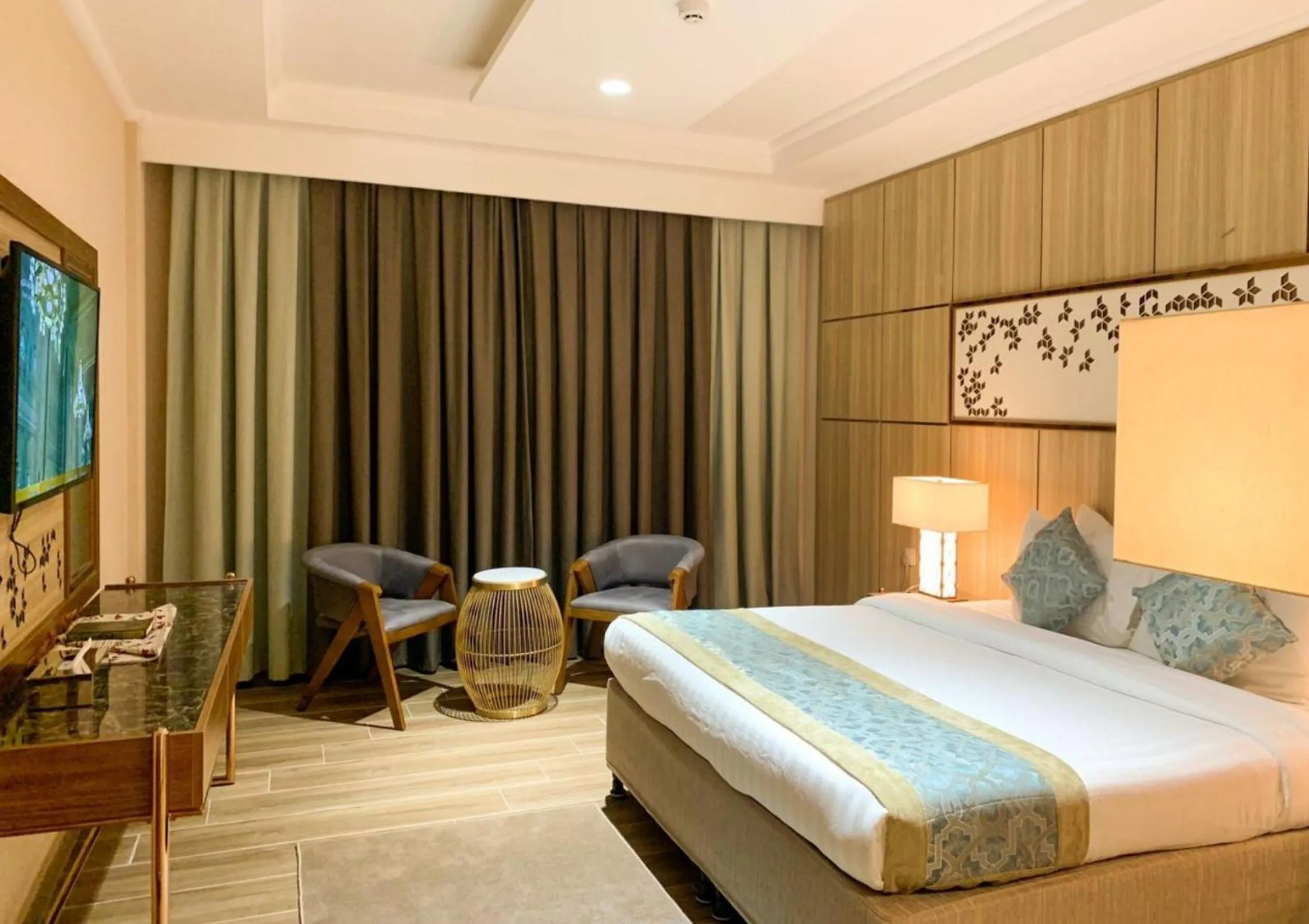 Bedroom, Bed in Midan Hotel & Suites Al Aziziya