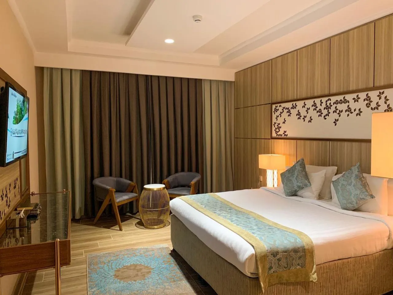 Bedroom, Bed in Midan Hotel & Suites Al Aziziya