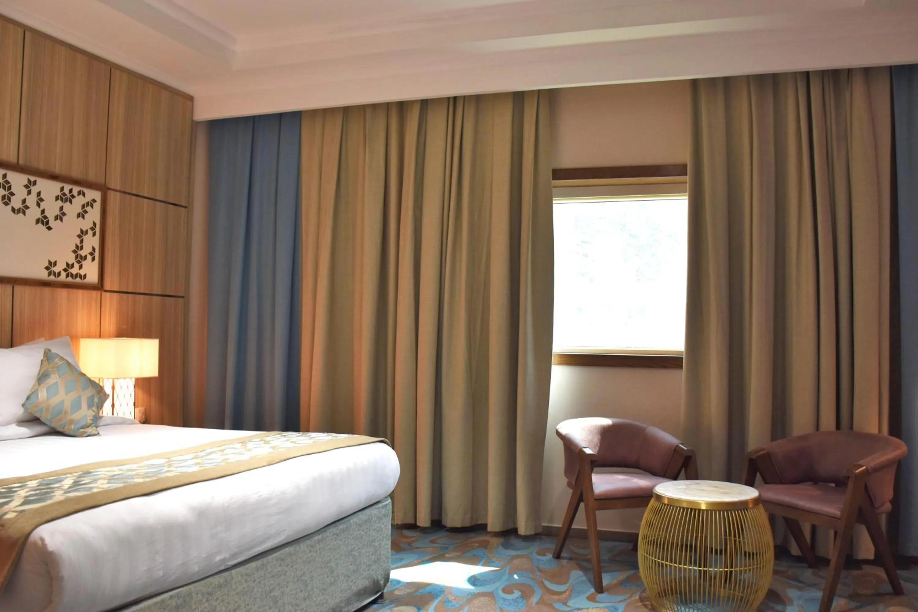Bed in Midan Hotel & Suites Al Aziziya