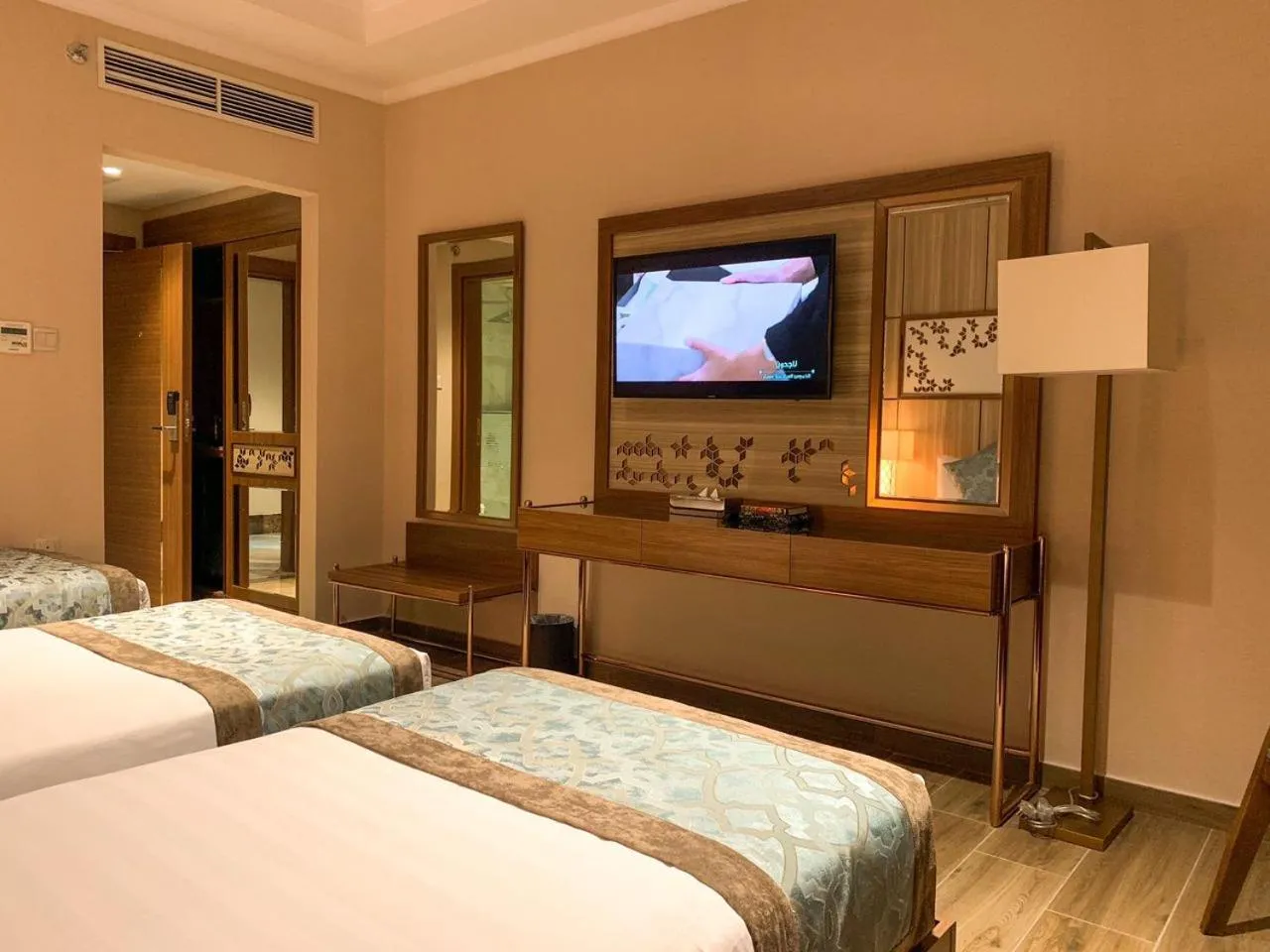 Bed in Midan Hotel & Suites Al Aziziya