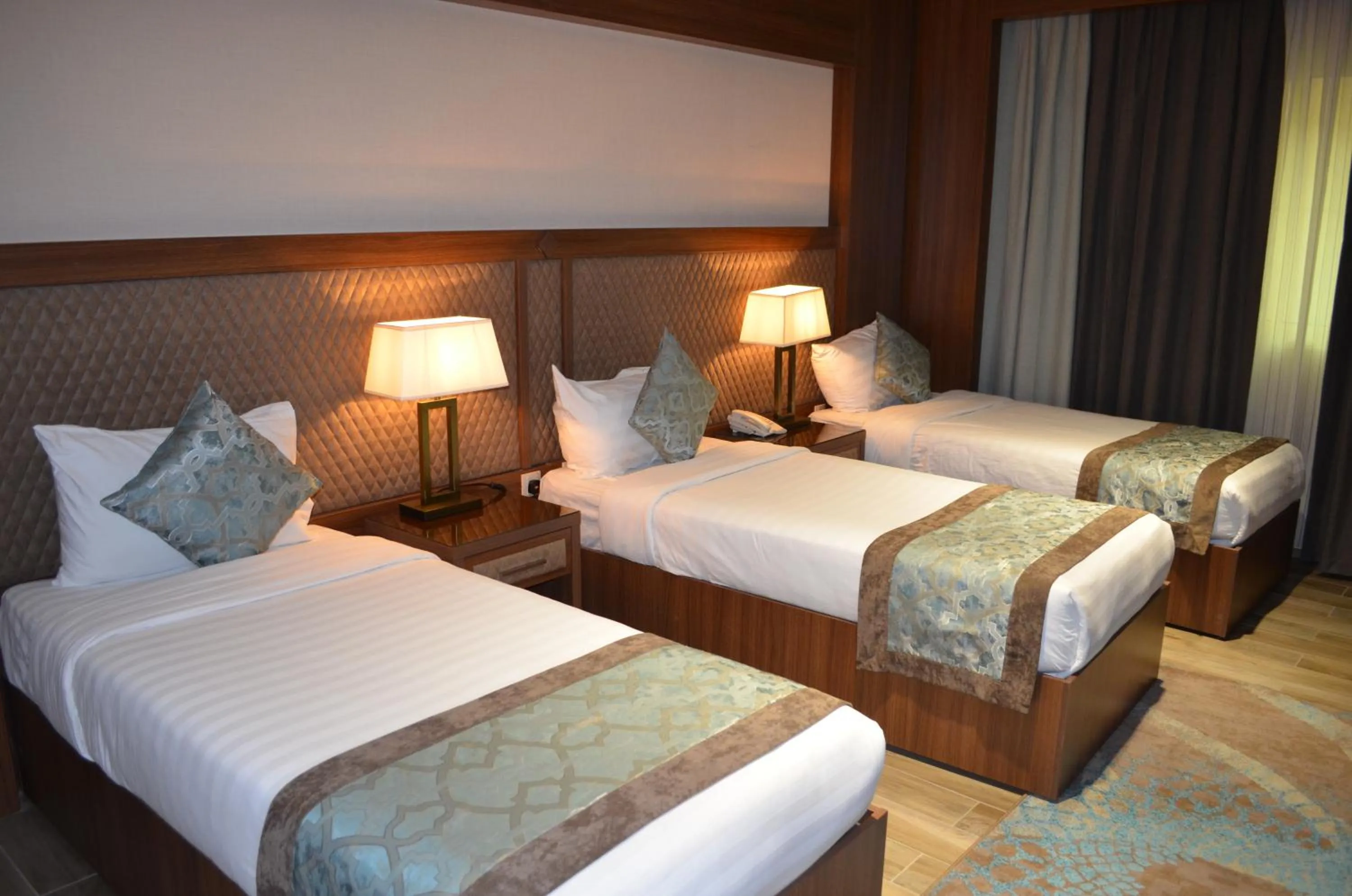 Bedroom, Bed in Midan Hotel & Suites Al Aziziya