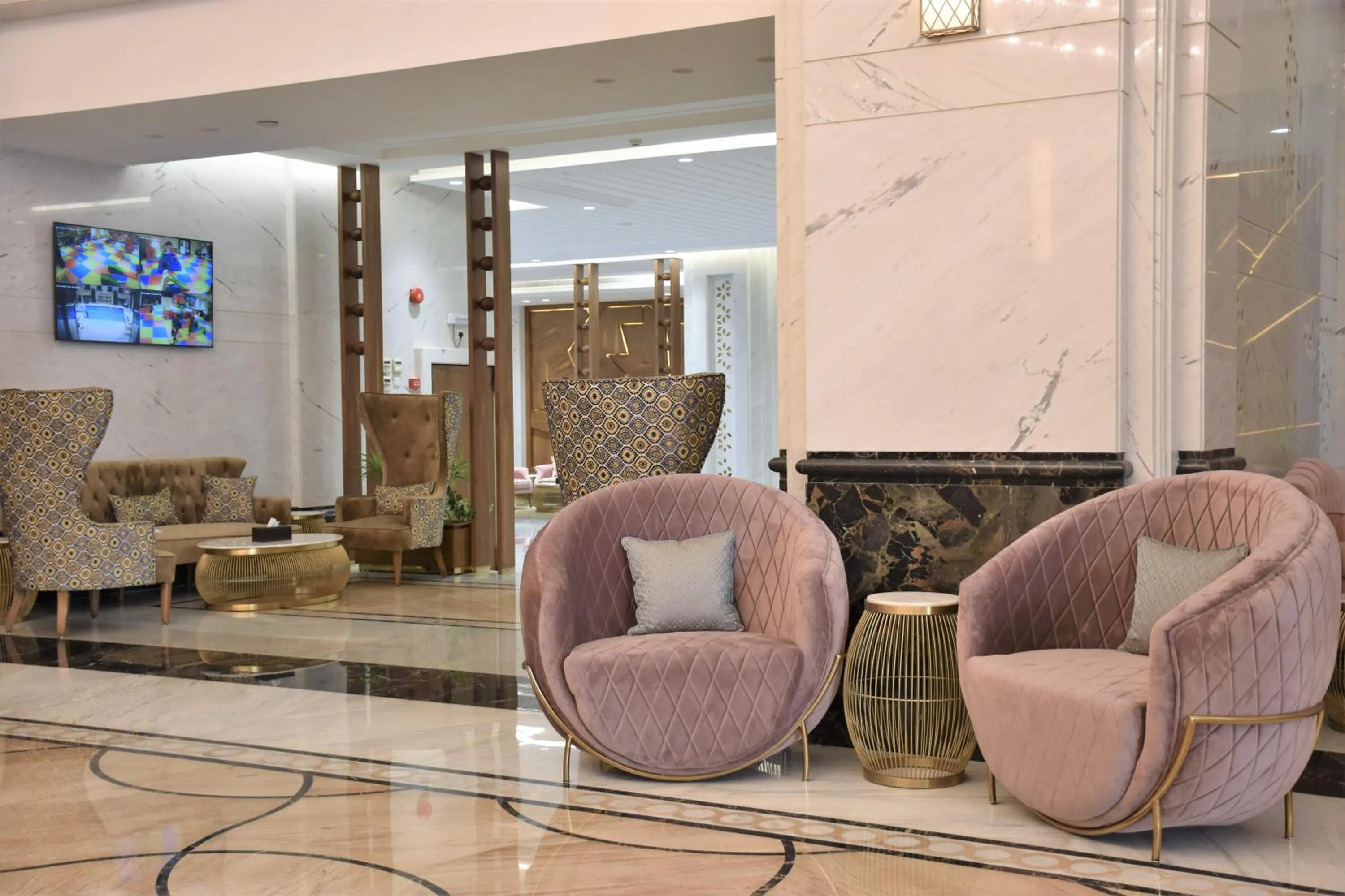 Lobby or reception in Midan Hotel & Suites Al Aziziya