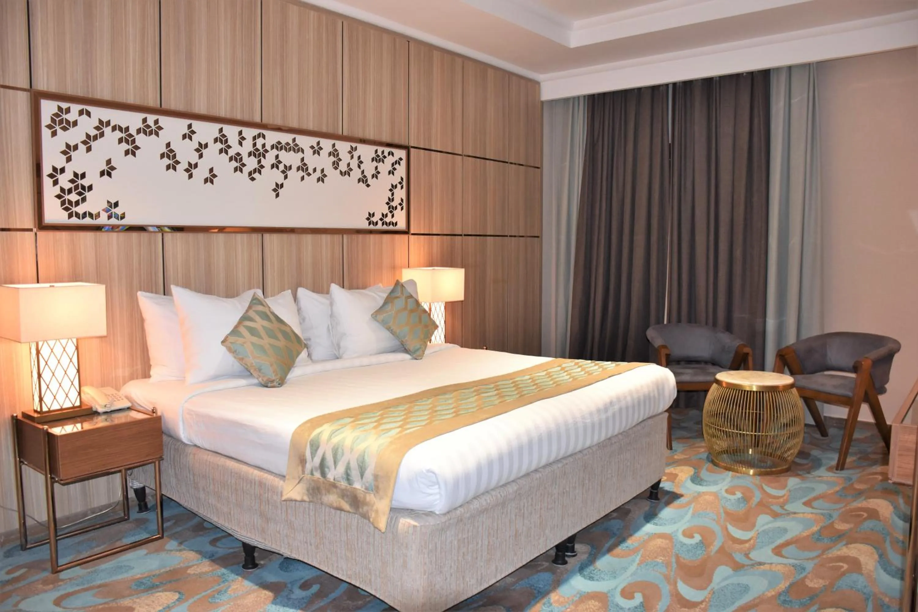 Bedroom, Bed in Midan Hotel & Suites Al Aziziya