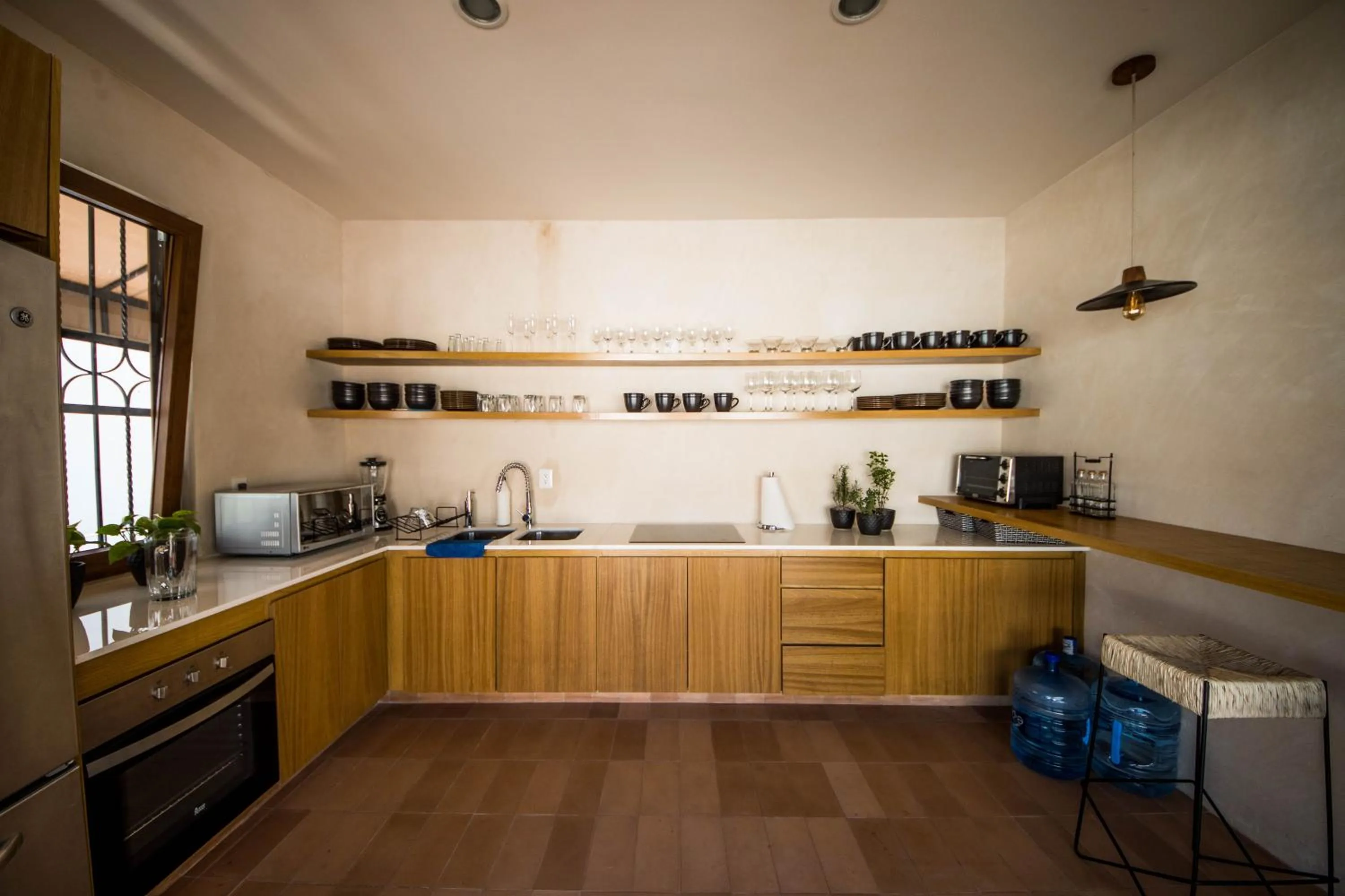 Communal kitchen in Casa Montore by Barrio Mexico
