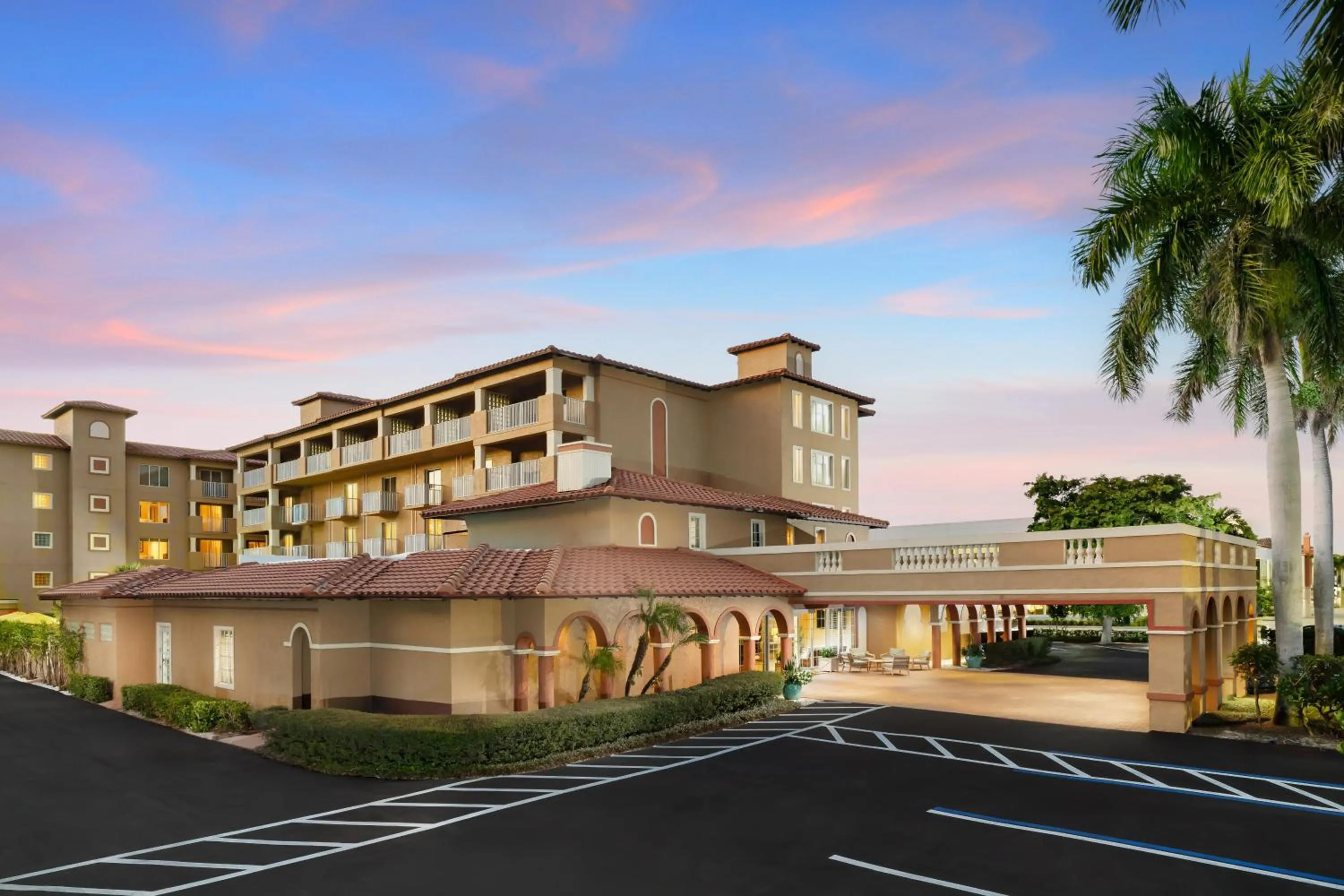 Property building in Inn of Naples, Tapestry Collection by Hilton