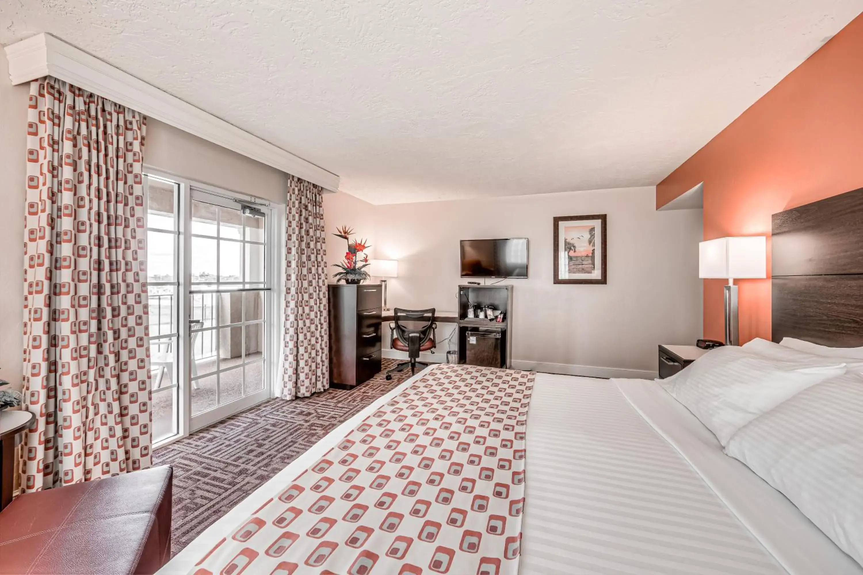 King Room with Balcony and Roll-In Shower - Mobility Access in Inn of Naples, Tapestry Collection by Hilton King Room with Balcony and Roll-In Shower - Mobility Access in Inn of Naples, Tapestry Collection by Hilton