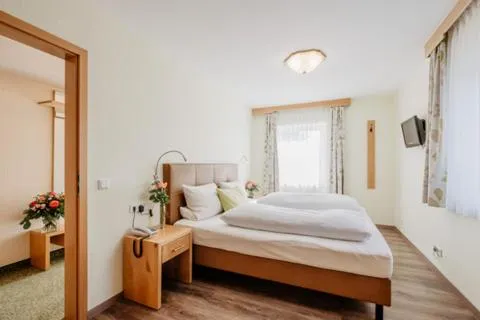 Bed in Hotel Garni Vier Jahreszeiten