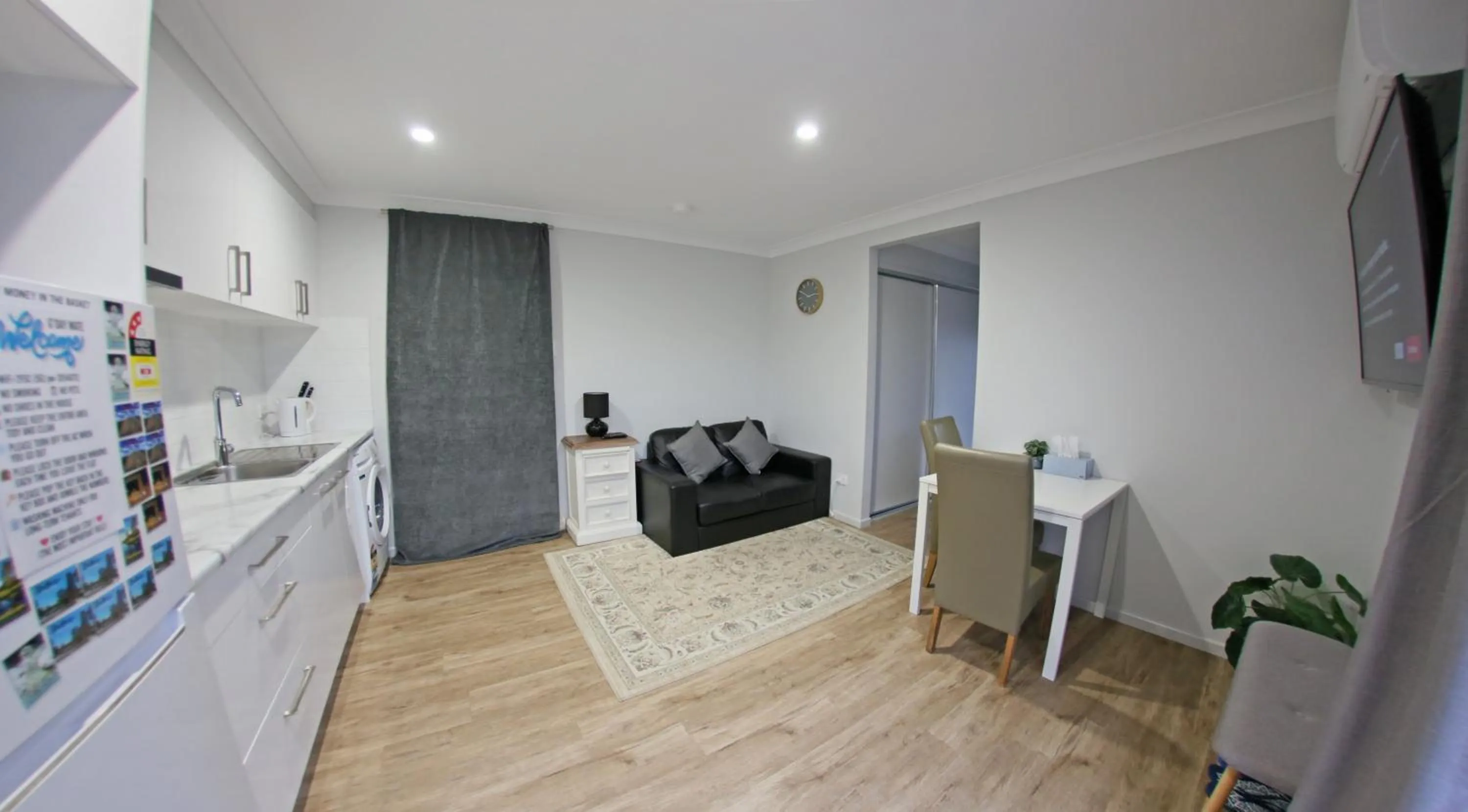 Communal lounge/ TV room in Granny Flat next to golf course