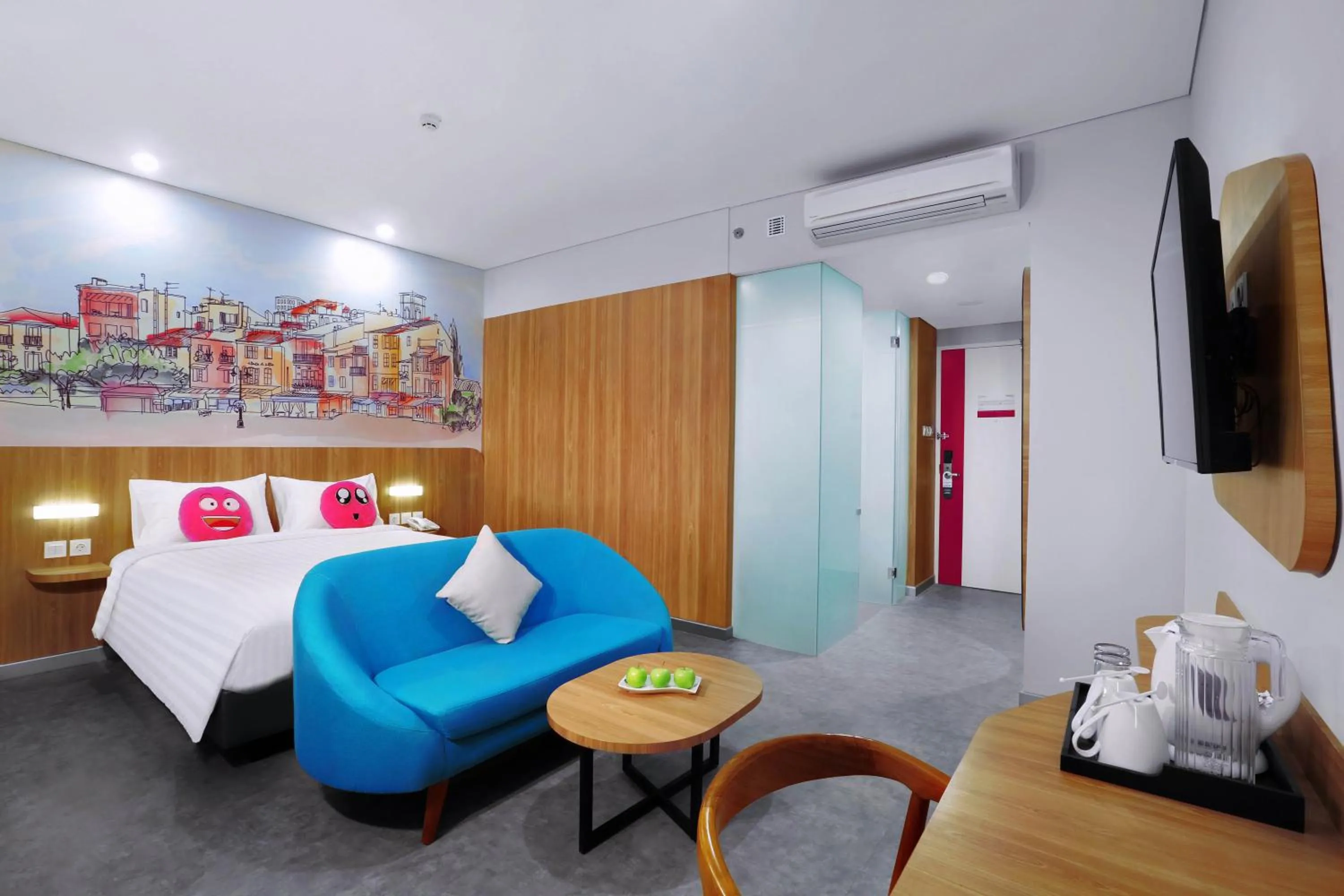 Living room, Bed in favehotel Ketapang