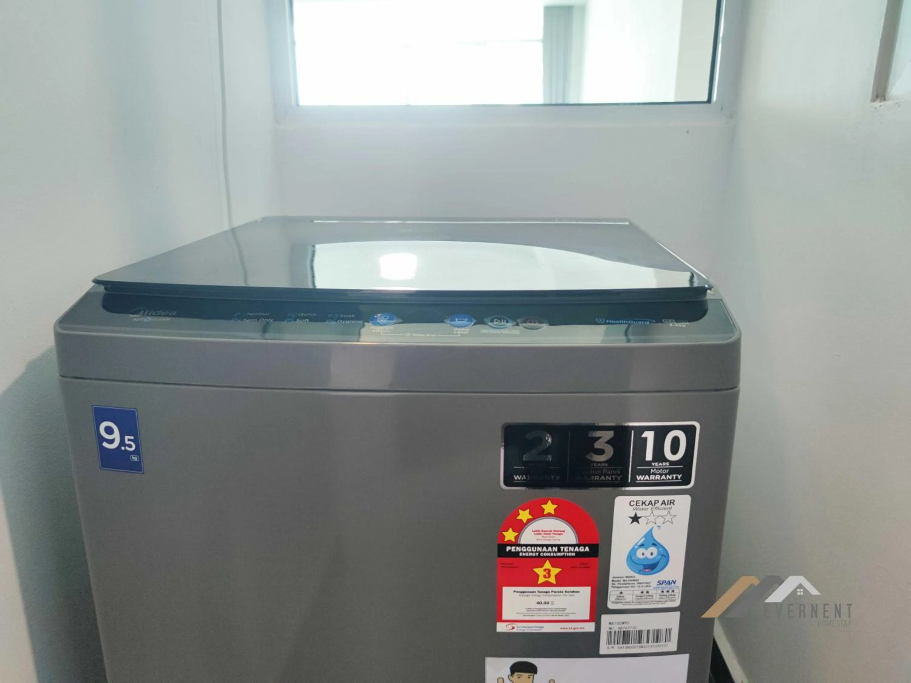 washing machine in Bay Resort by Evernent