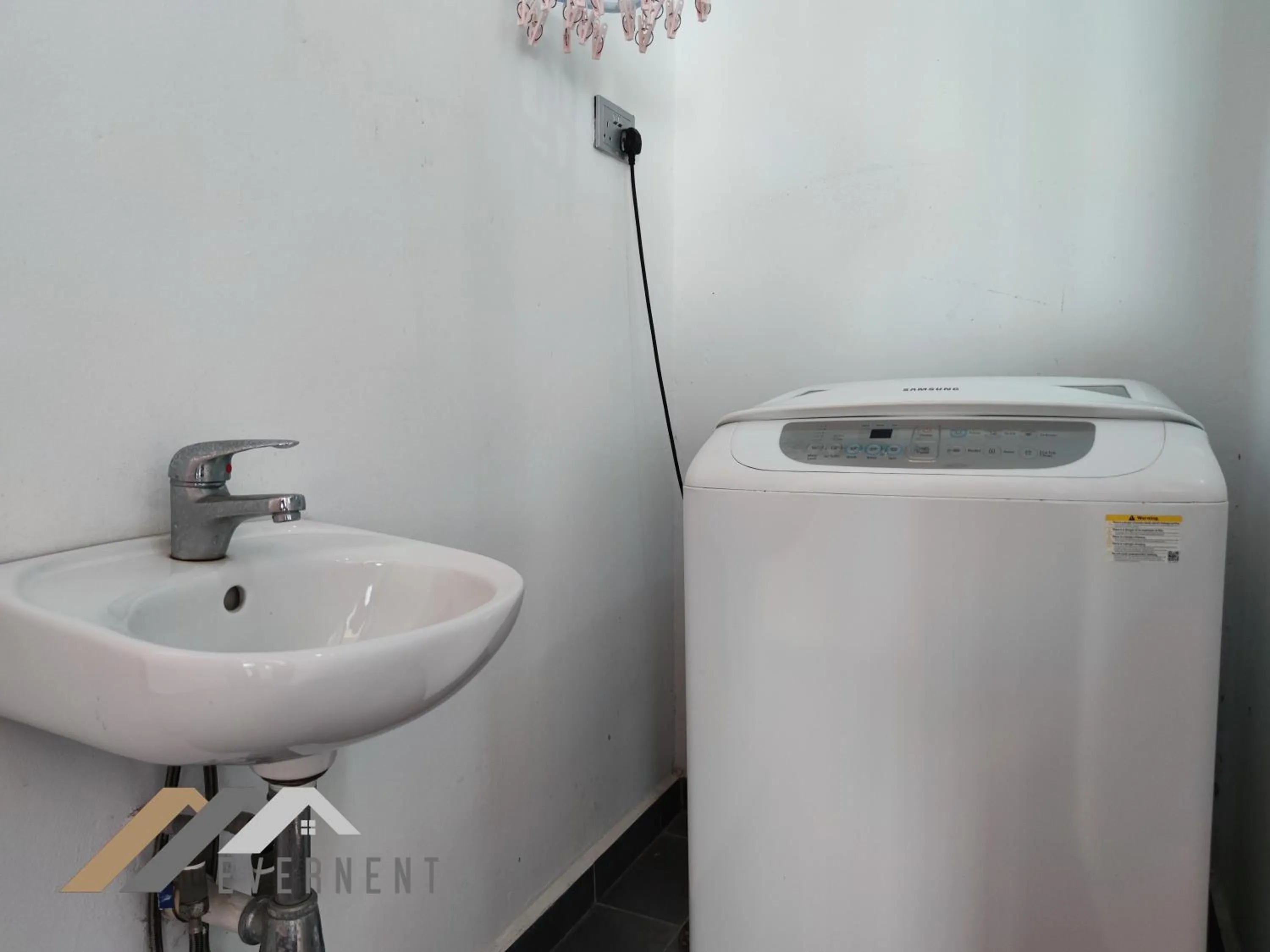 washing machine in Bay Resort by Evernent