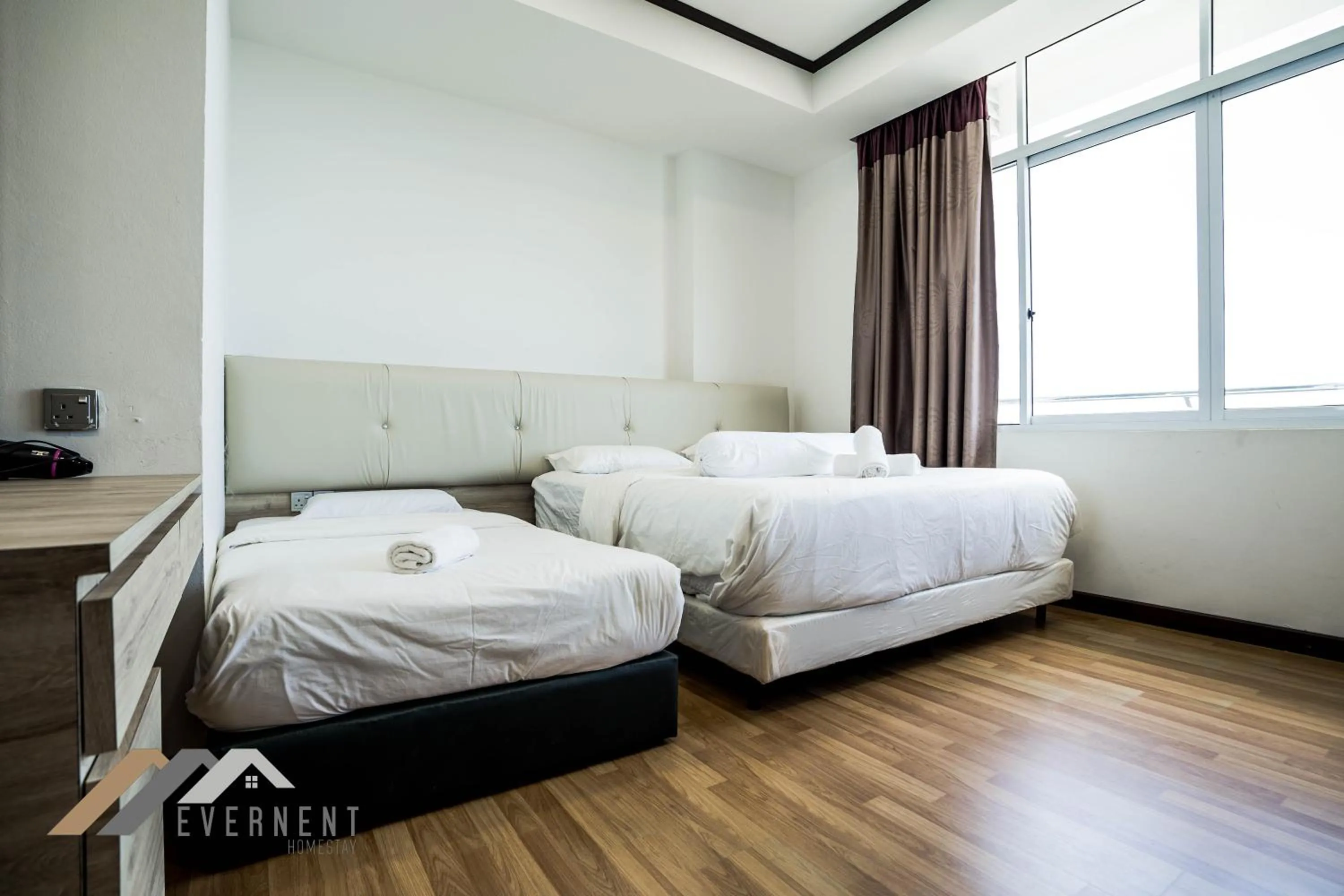 Bed in Bay Resort by Evernent