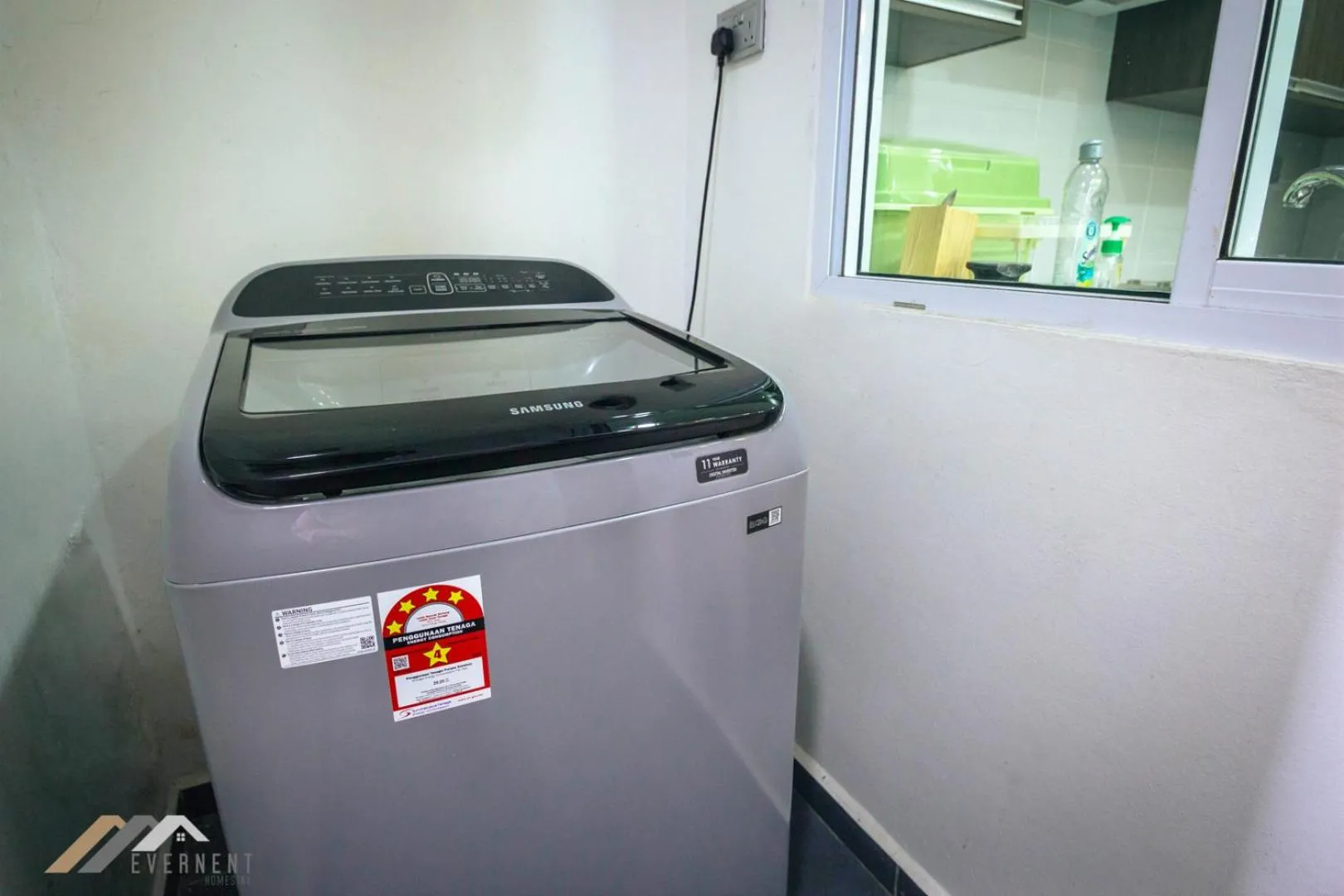 washing machine in Bay Resort by Evernent