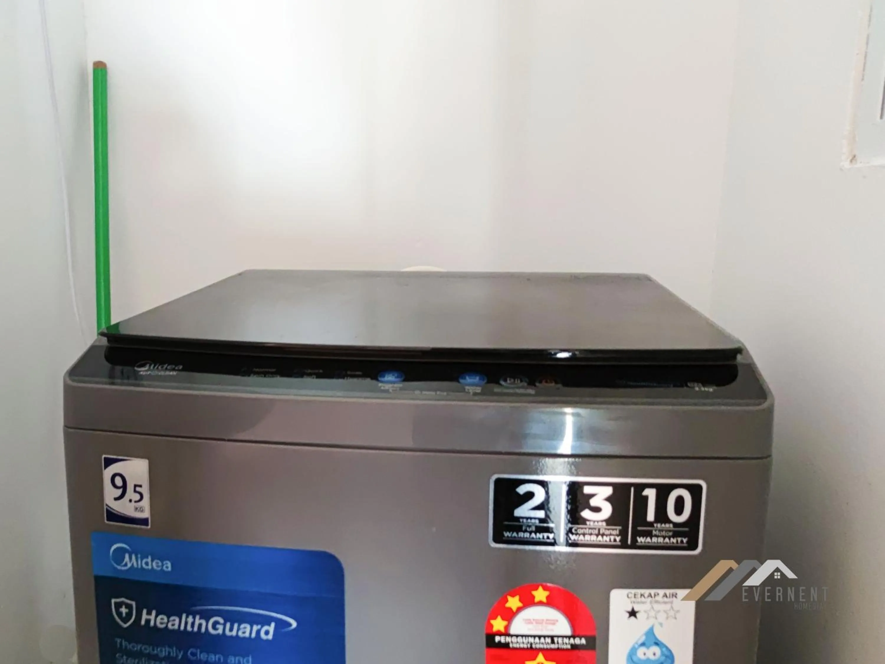 washing machine in Bay Resort by Evernent