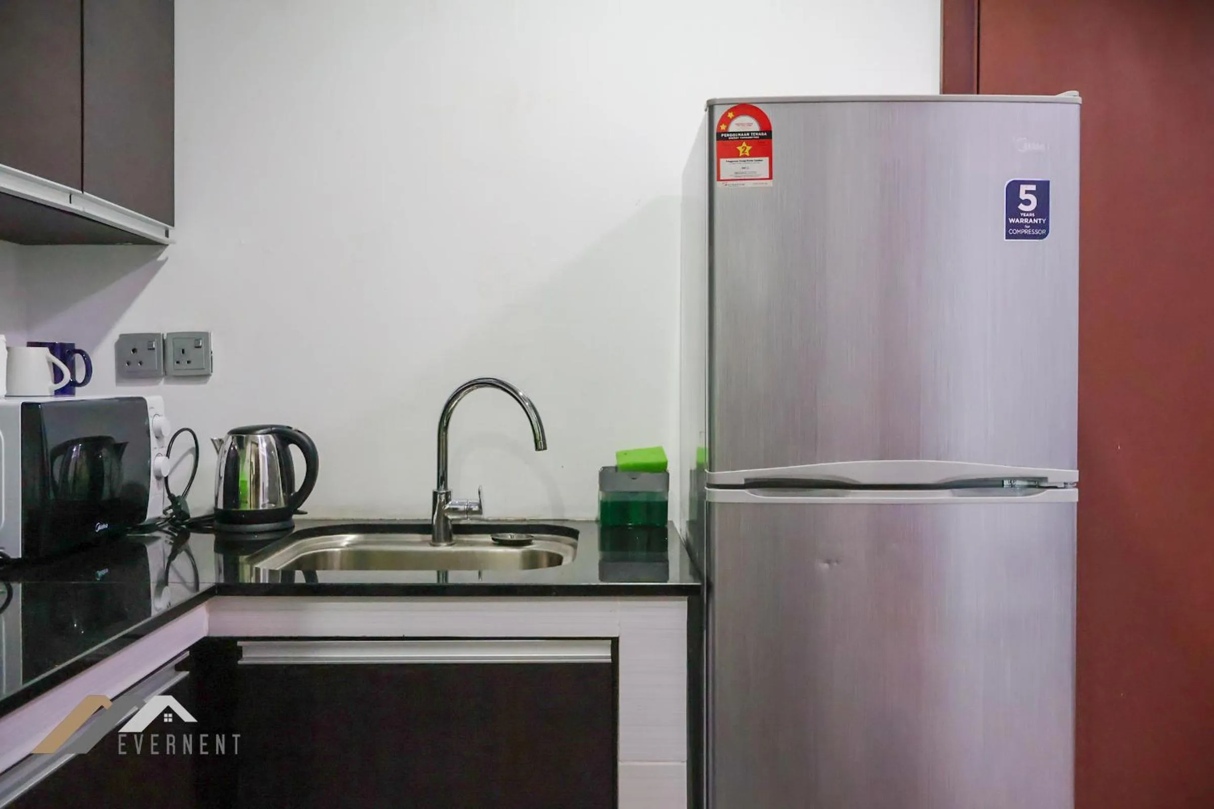 Kitchen or kitchenette in Bay Resort by Evernent