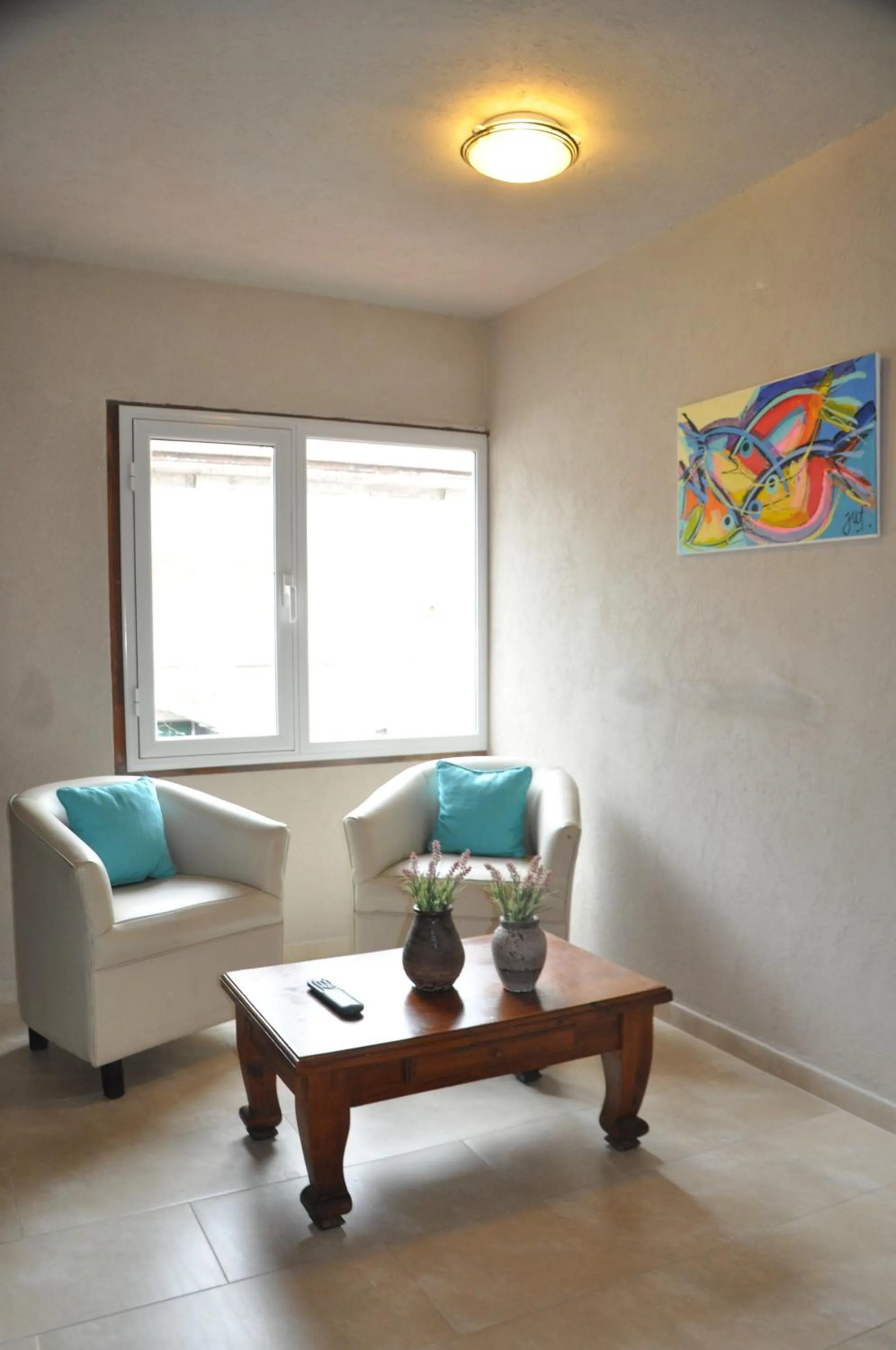 Communal lounge/ TV room in Hotel Victoria