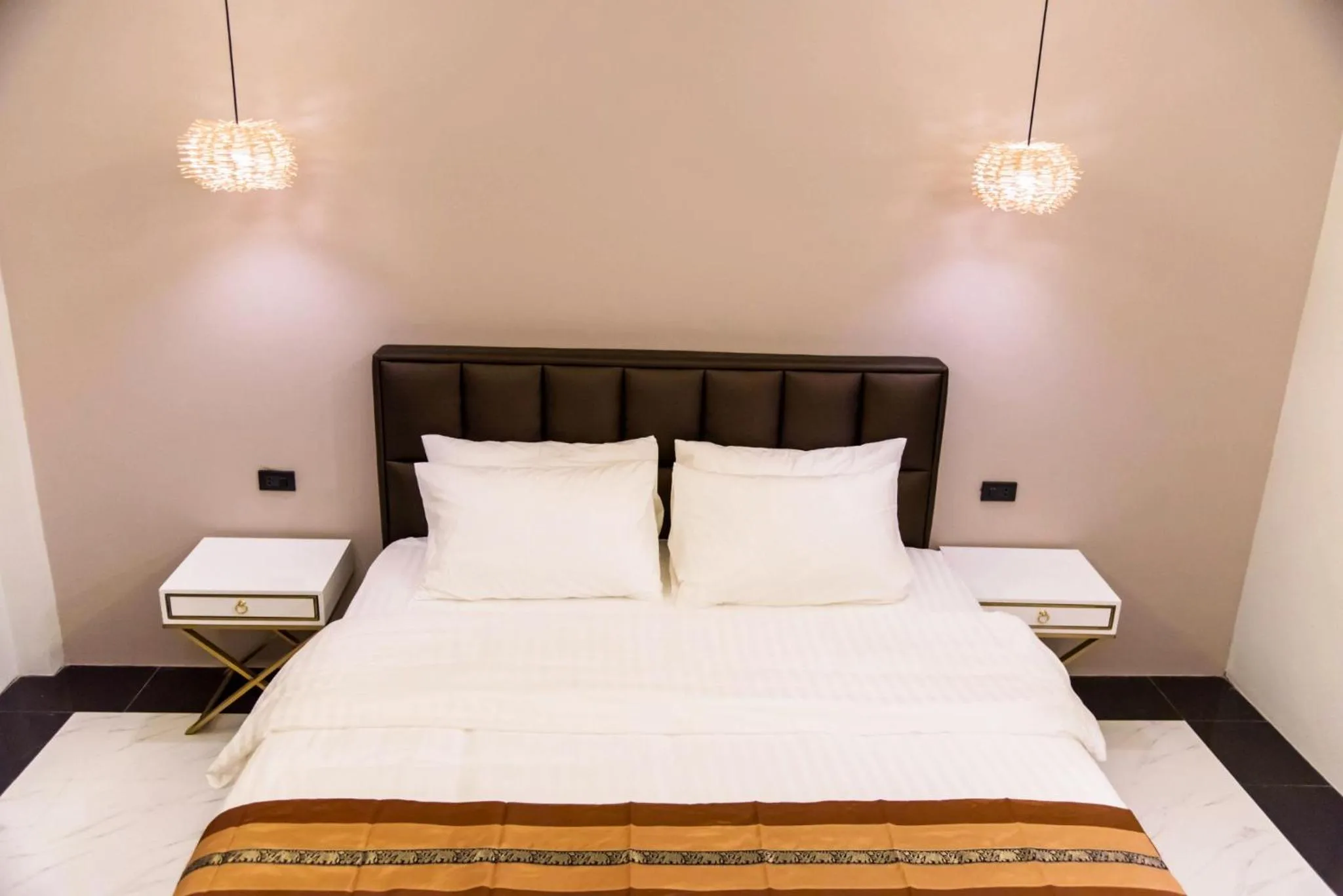 Bed in Worachat Boutique Hotel